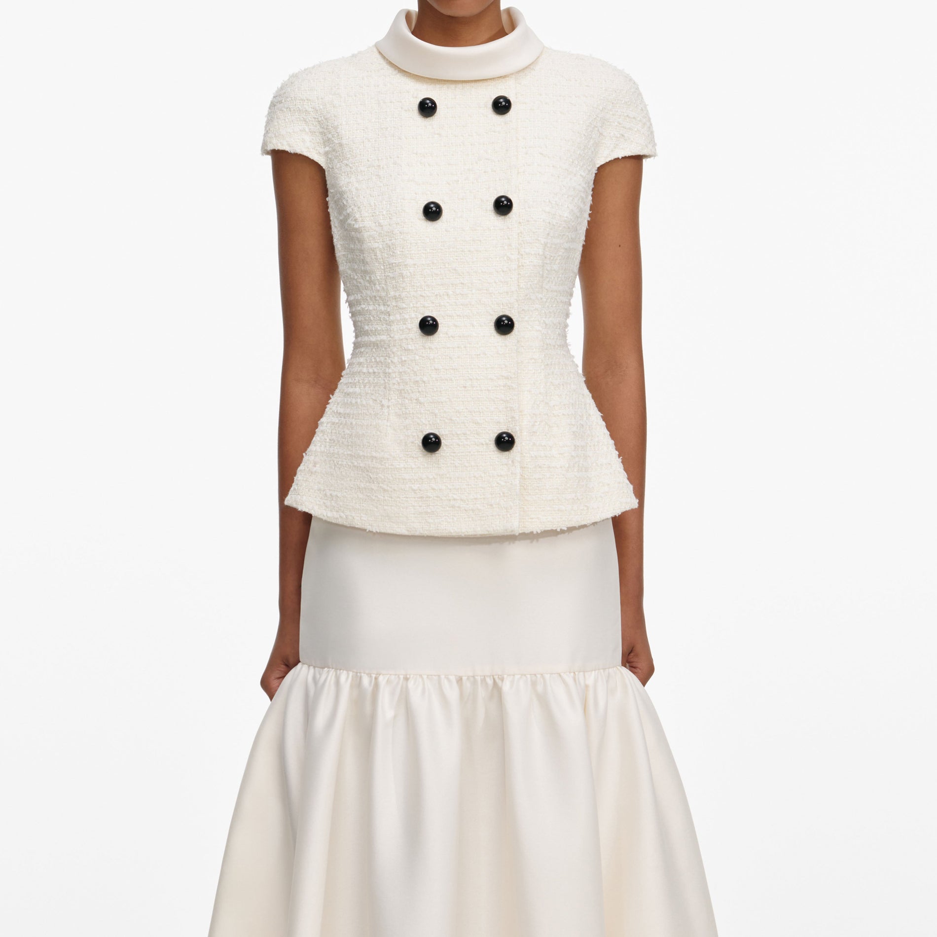 A close up of a woman wearing the Cream Boucle Taffeta Maxi Dress