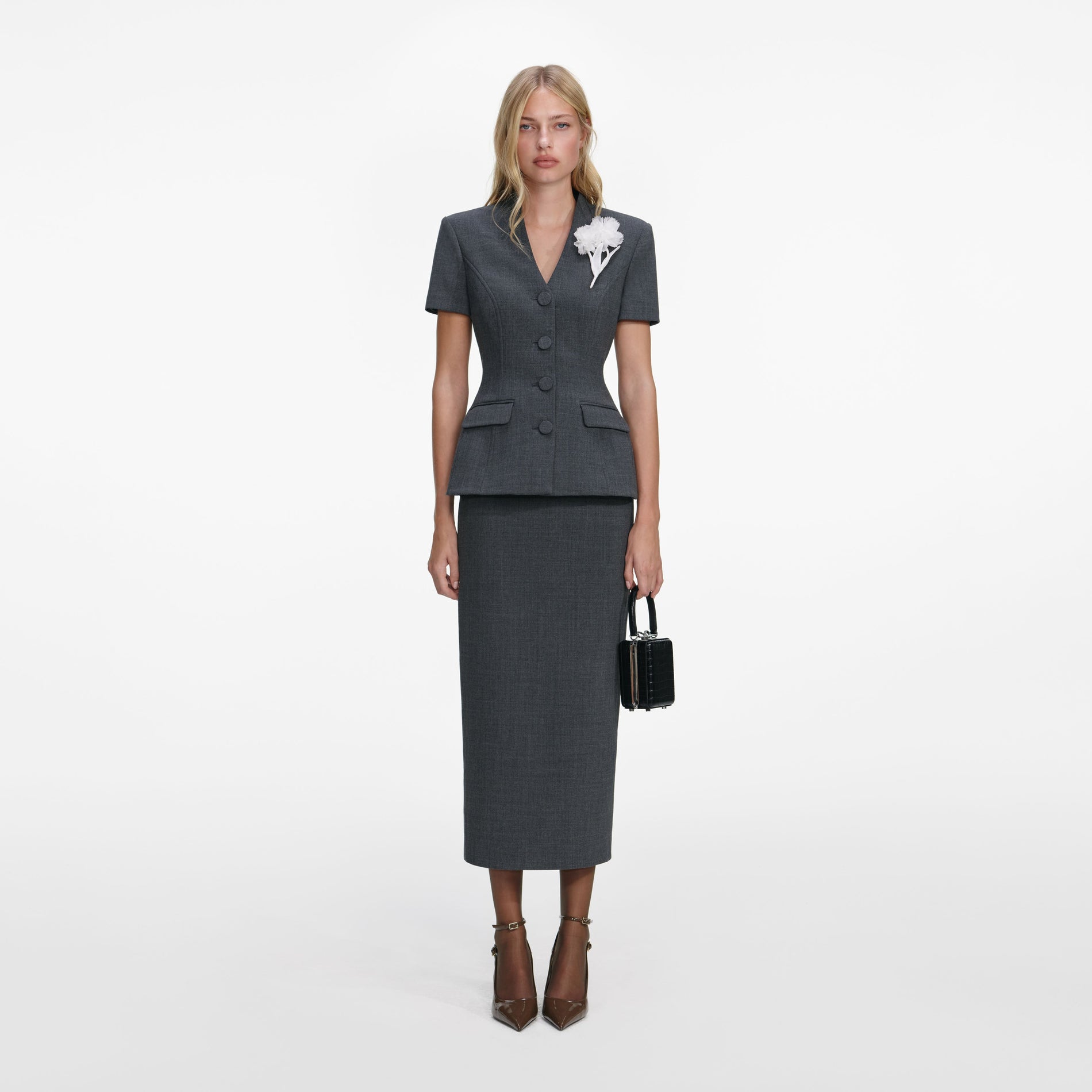 Front view of a woman wearing the Grey Tailored Flower Detail Midi Dress