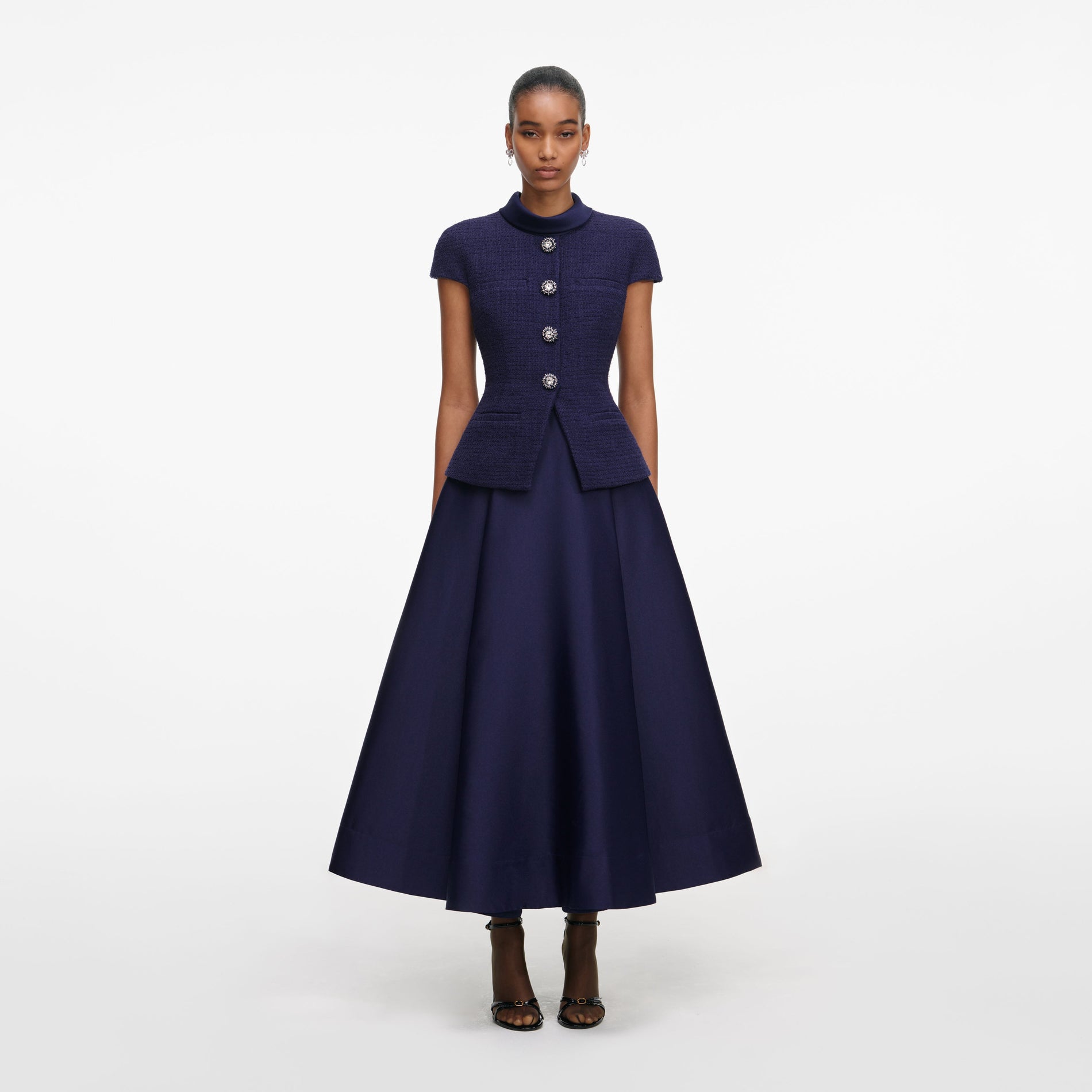 Front view of a woman wearing the Navy Boucle Taffeta Midi Dress
