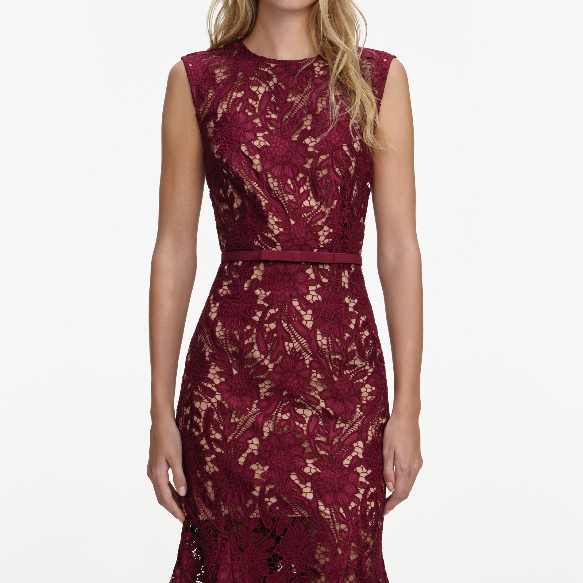 A close up of a woman wearing the Burgundy Guipure Lace Midi Dress