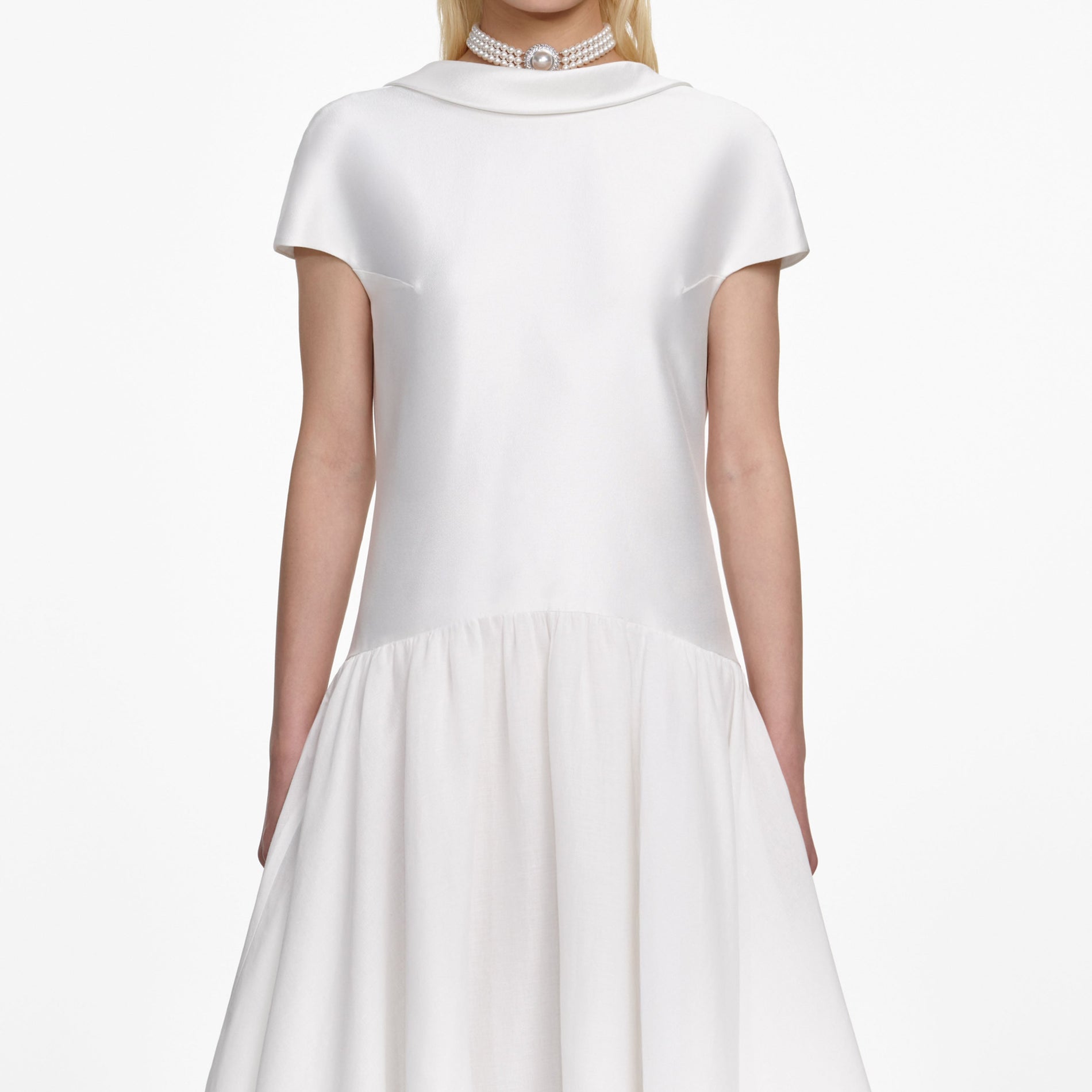 A close up of a woman wearing the White Satin Ramie Midi Dress