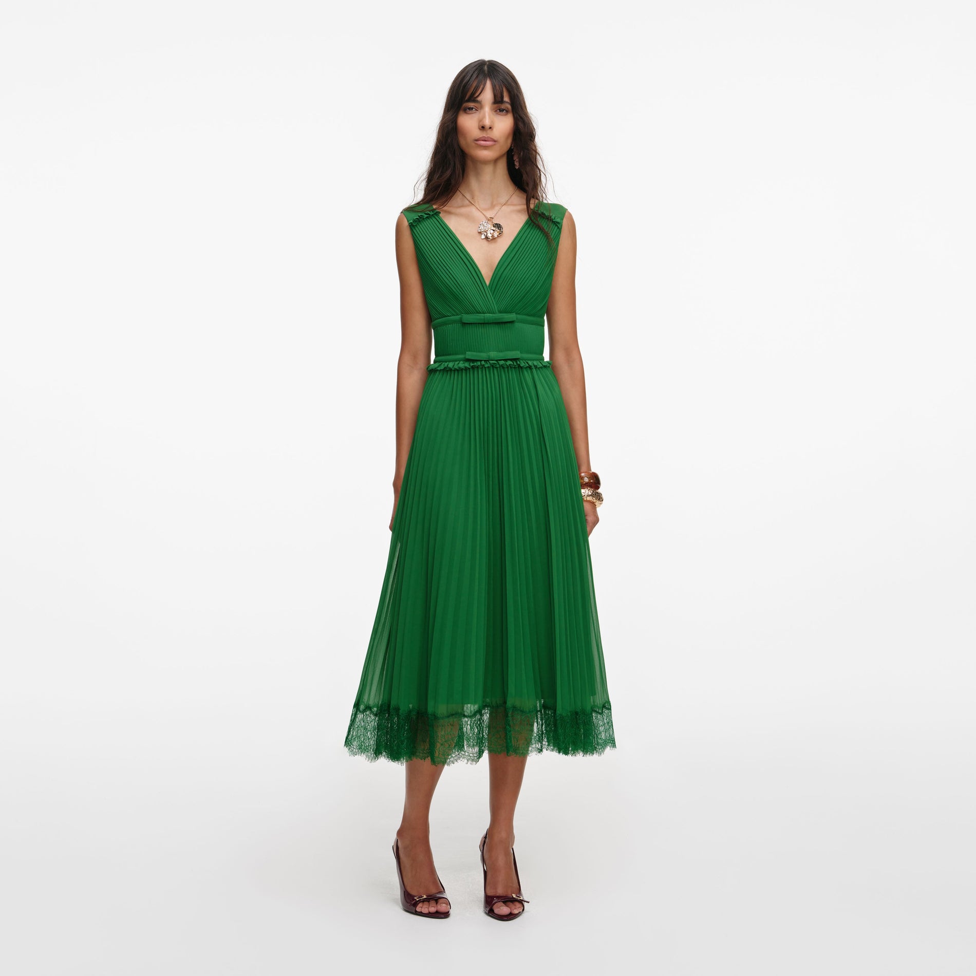 Front view of a woman wearing the Green Chiffon Midi Dress