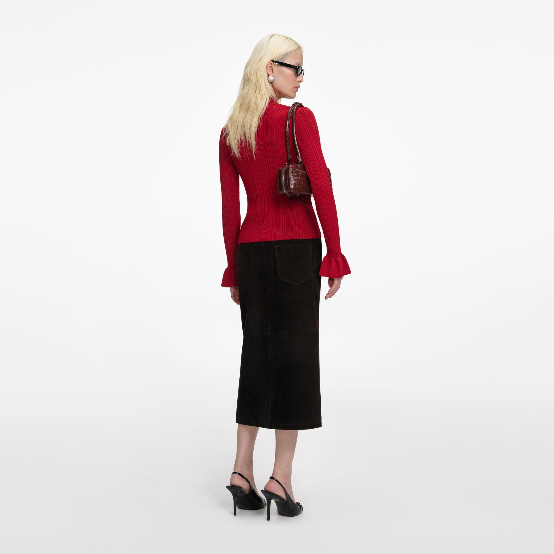Back view of a woman wearing the Red Viscose Cardigan
