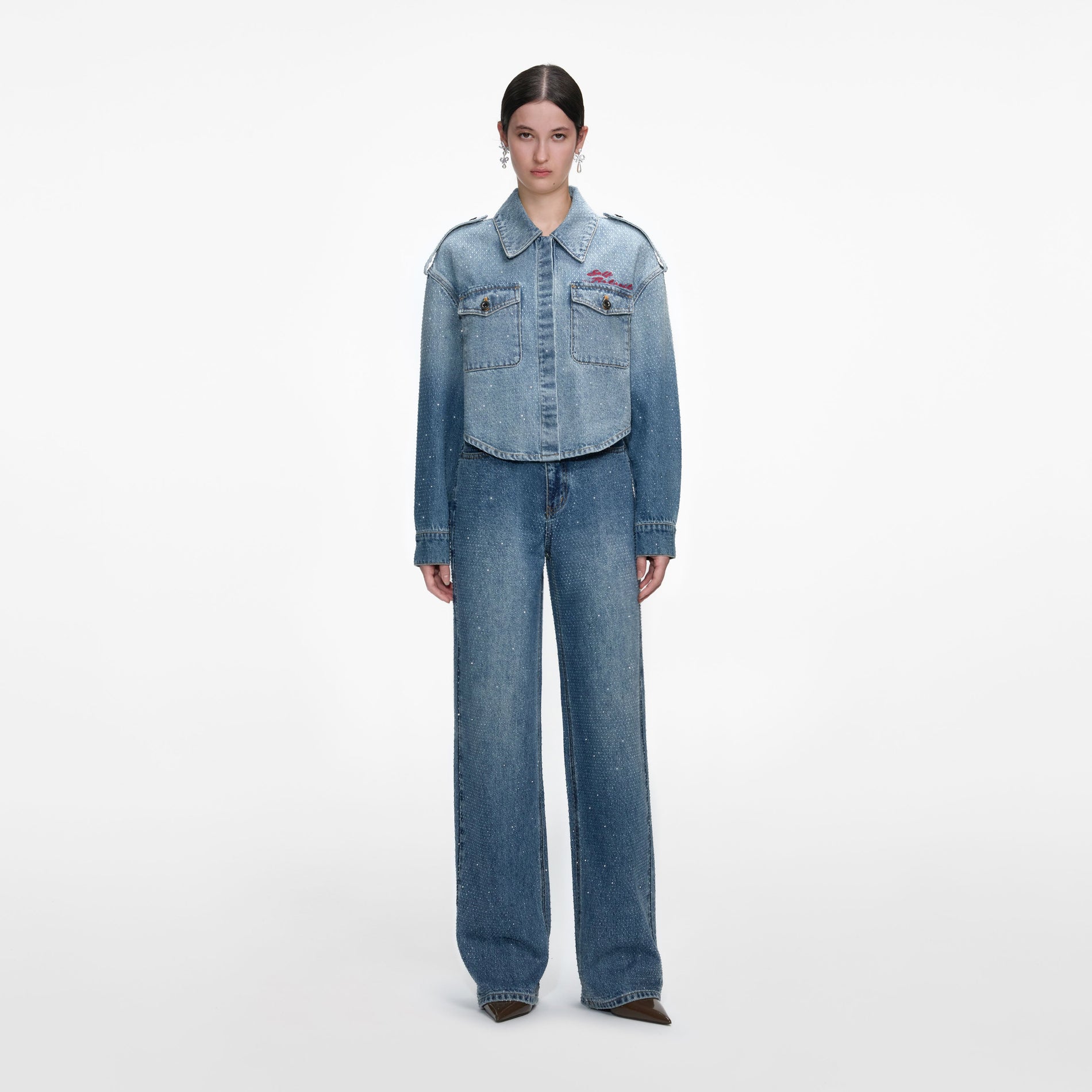 Front view of a woman wearing the Rhinestone Denim Shirt