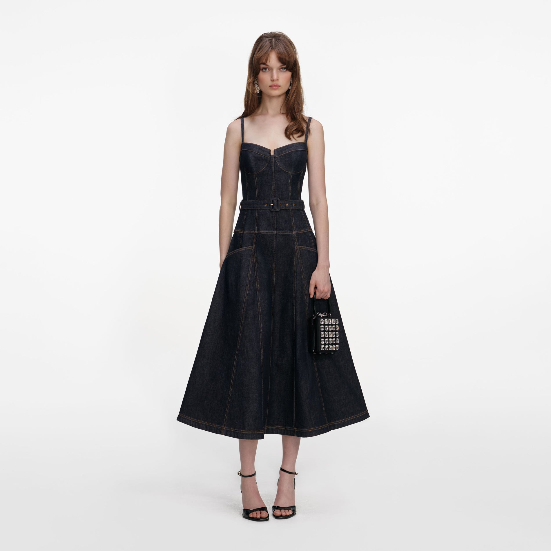 Front view of a woman wearing the Indigo Denim Flared Midi Dress