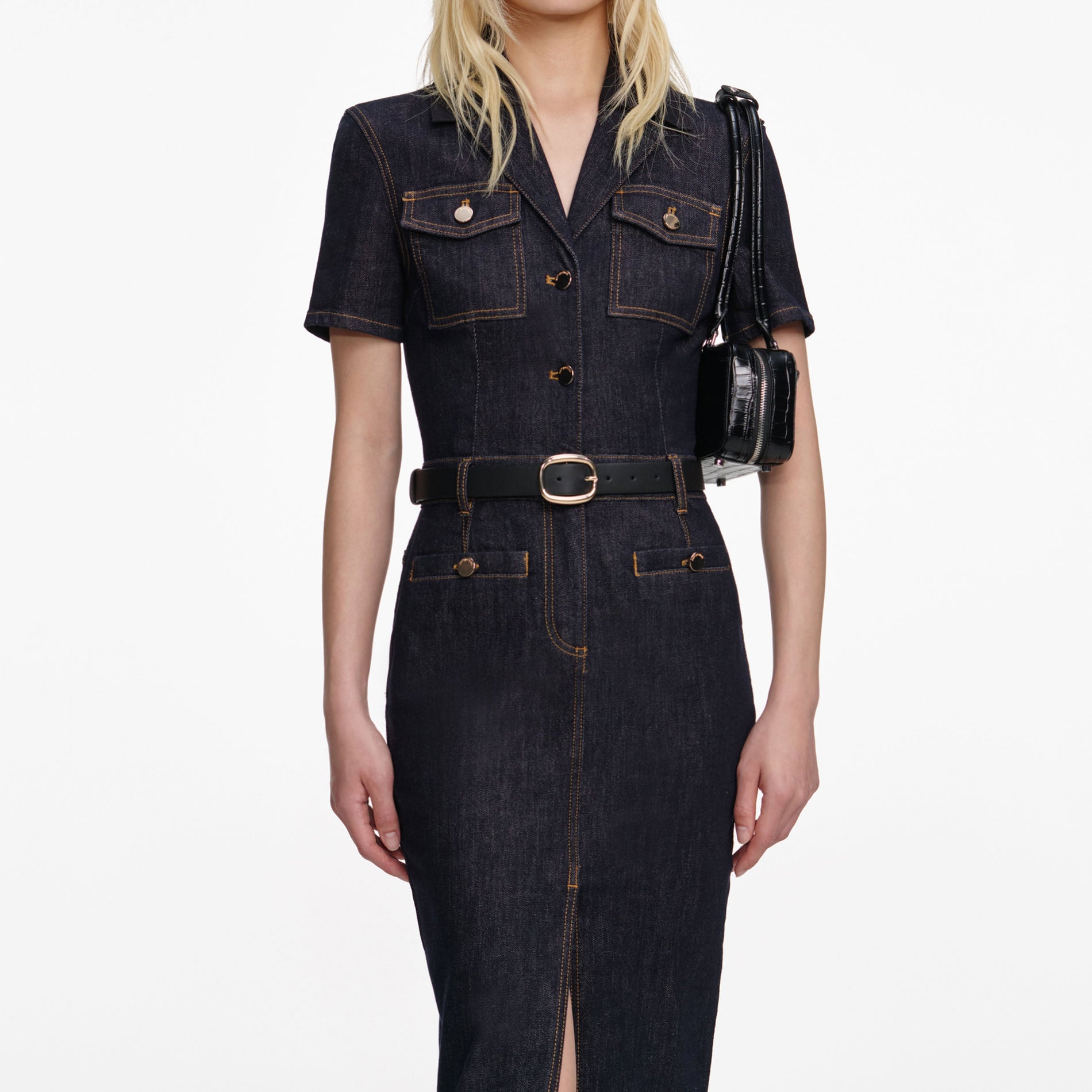 A close up of a woman wearing the Indigo Denim Midi Dress