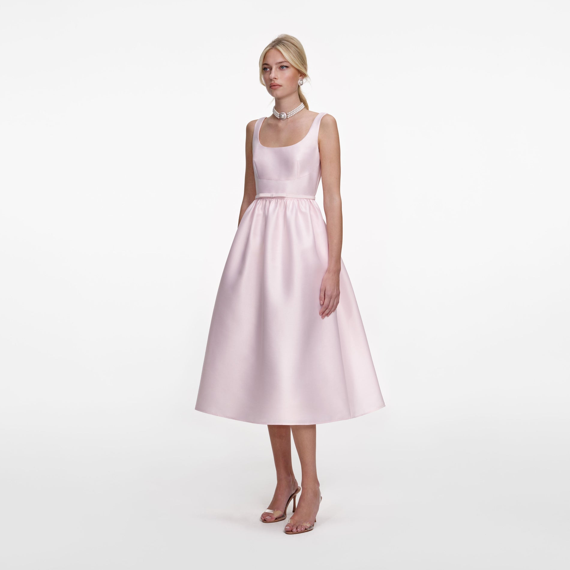 Side view of a woman wearing the Pink Taffeta Midi Dress