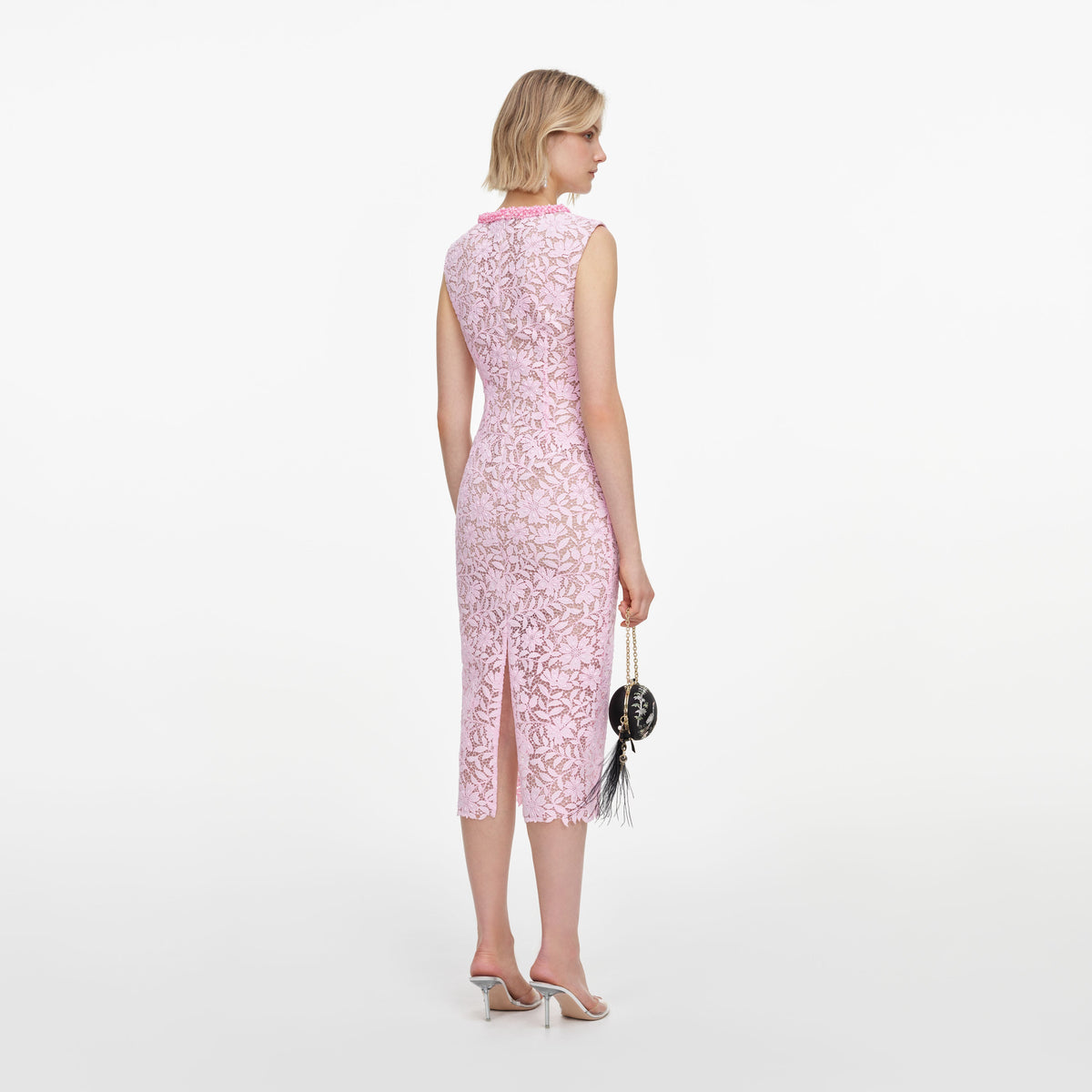 Back view of a woman wearing the Pink Lace Beaded Trim Midi Dress
