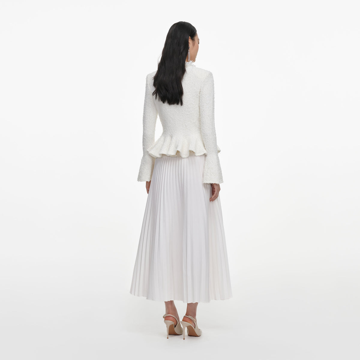 Back view of a woman wearing the White Textured Knit Chiffon Midi Dress