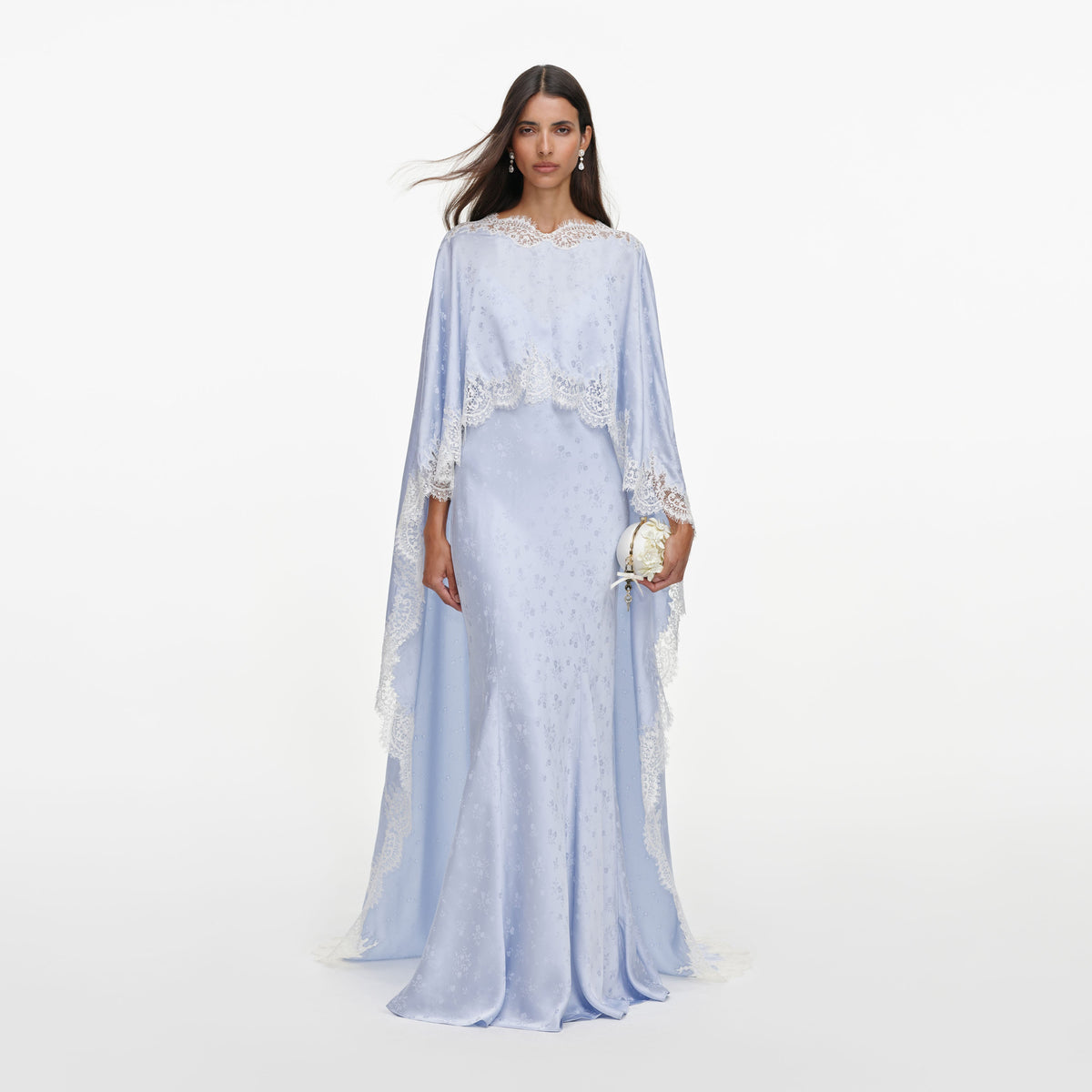 Front view of a woman wearing the Blue Satin Lace Cape Maxi Dress