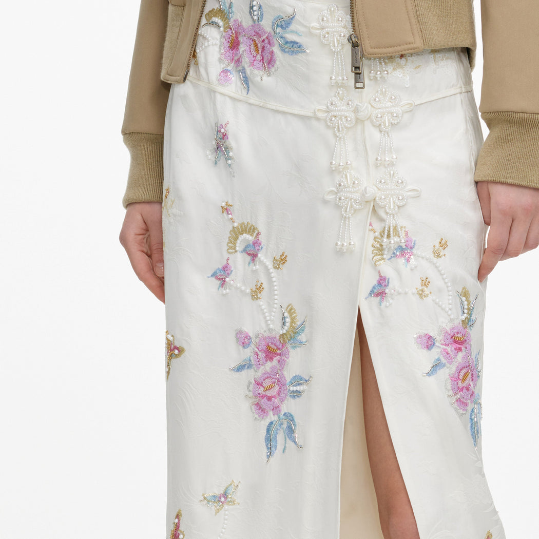 A close up of the fabric for the Cream Jacquard Floral Midi Skirt
