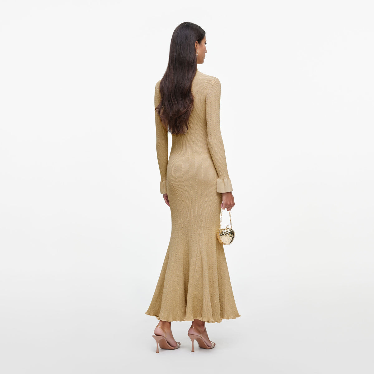 Back view of a woman wearing the Gold Metallic Knit Midi Dress