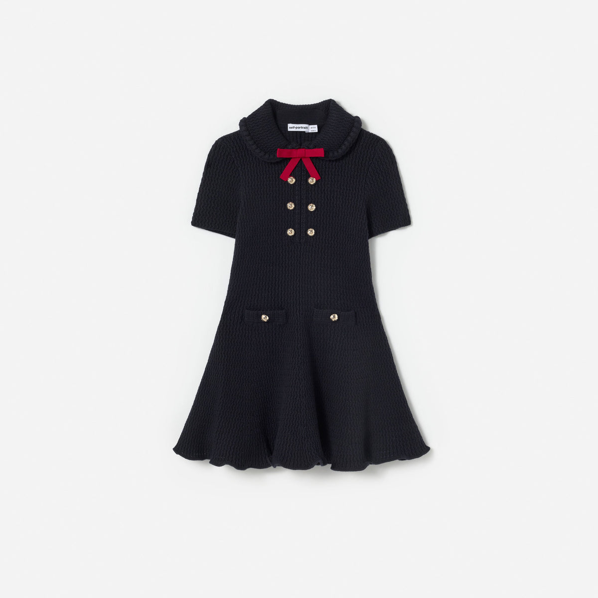 Front view of a girl wearing the Navy Viscose Knit Bow Collar Dress