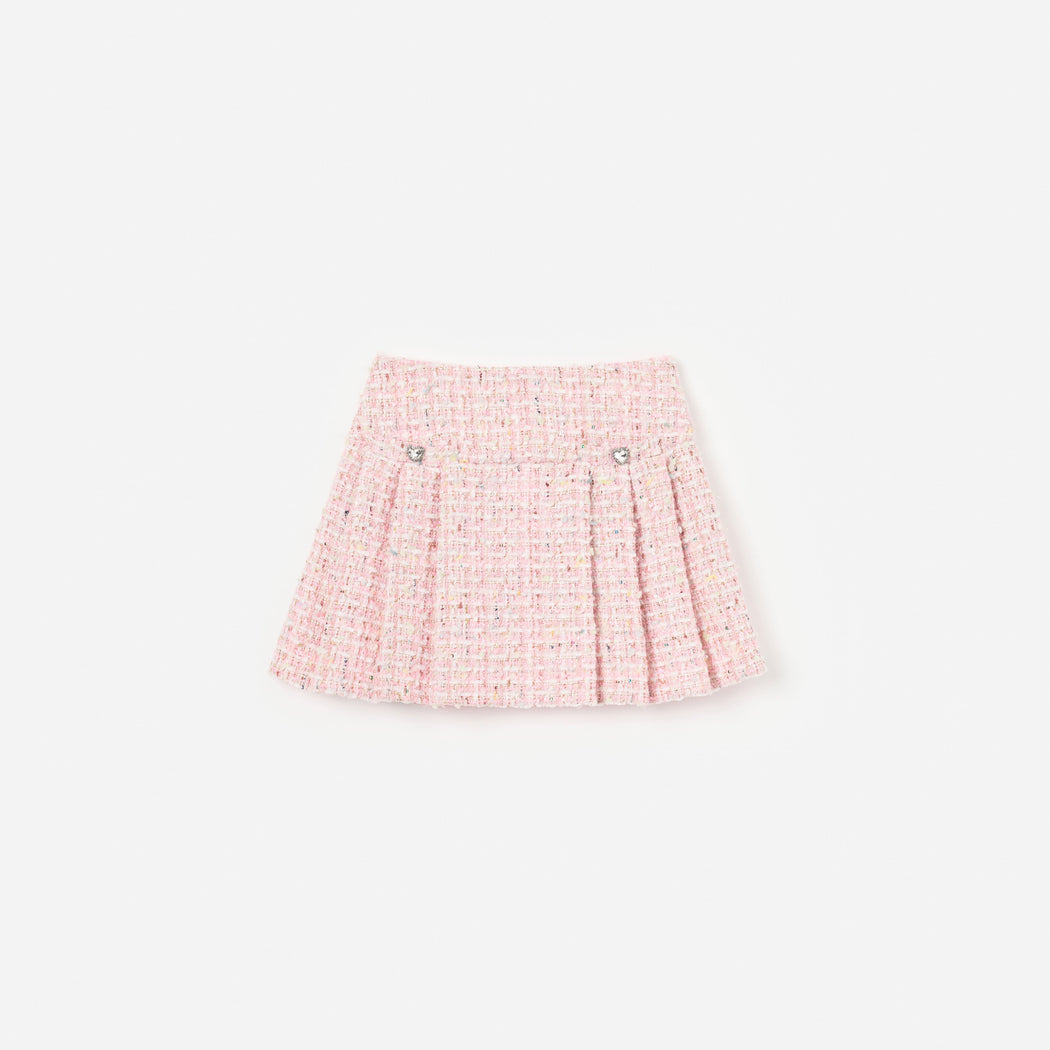 Front view of a girl wearing the Pink Textured Boucle Mini Skirt