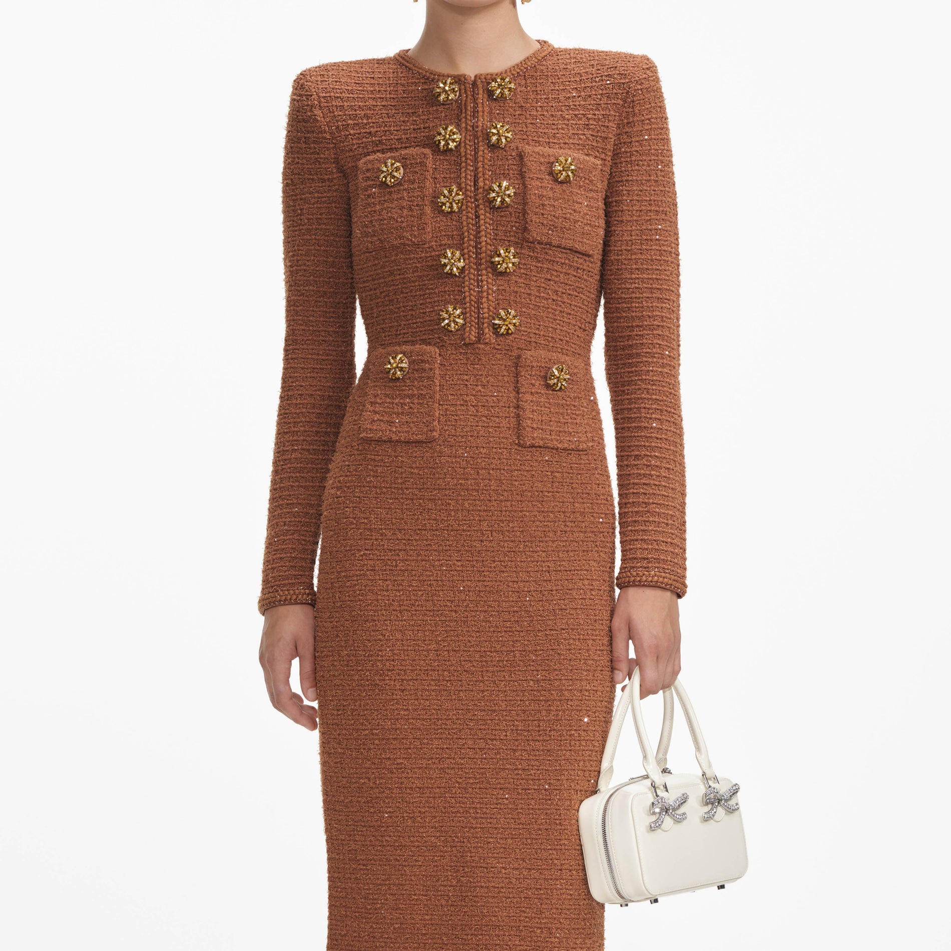 A close up of a woman wearing the Brown Textured Knit Midi Dress