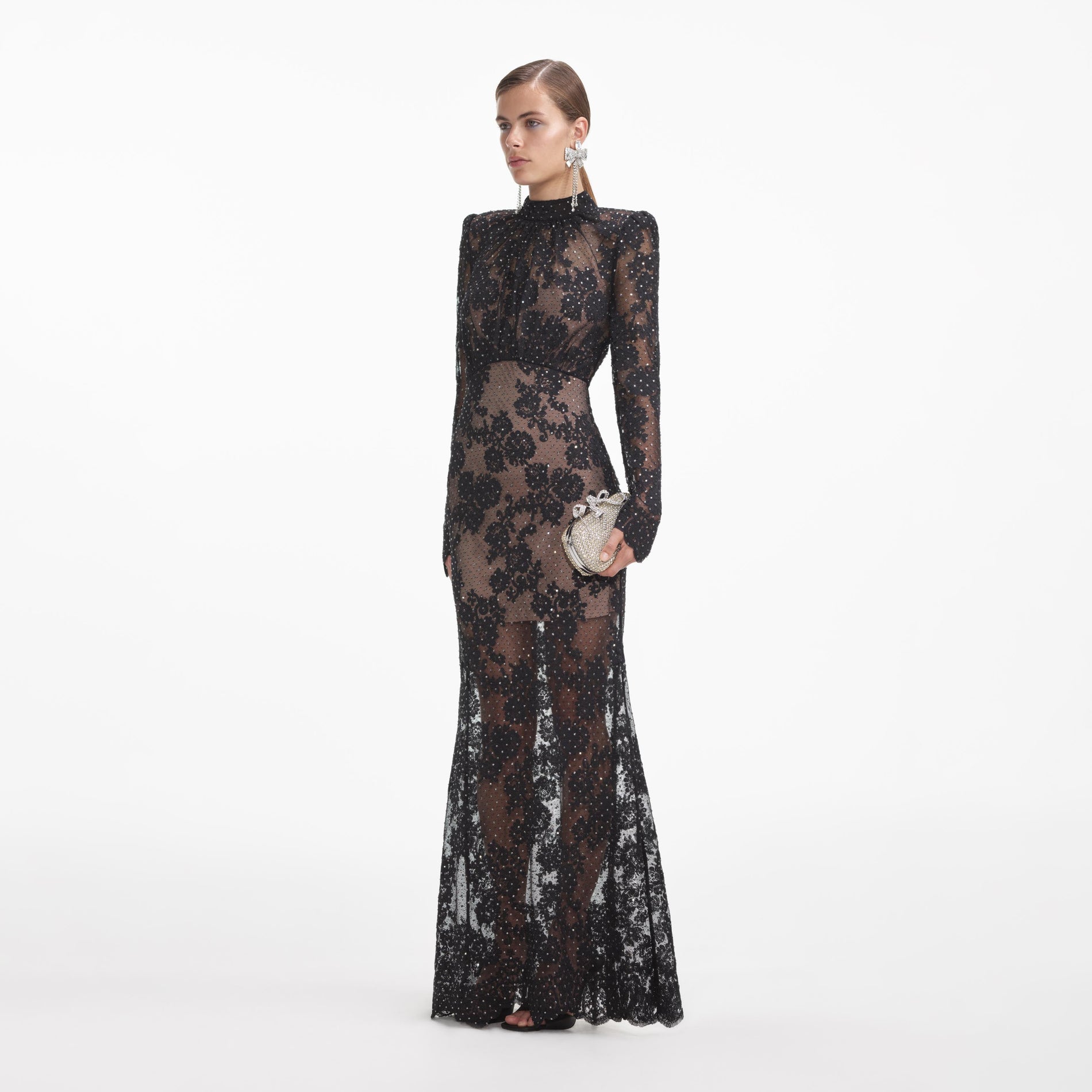 Side view of a woman wearing the Black Rhinestone Lace Maxi Dress