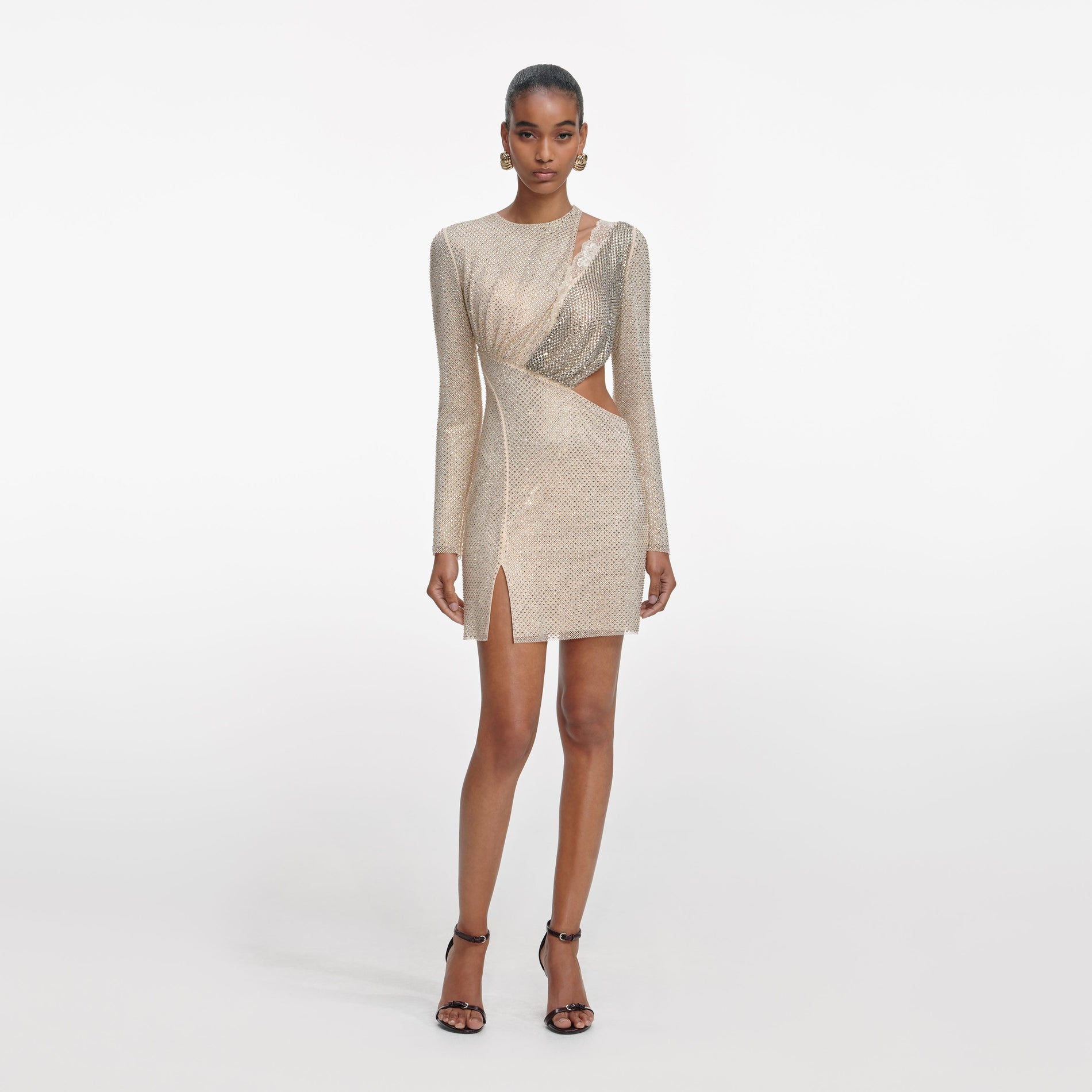 Front view of a woman wearing the Champagne Rhinestone Lace Trim Mini Dress