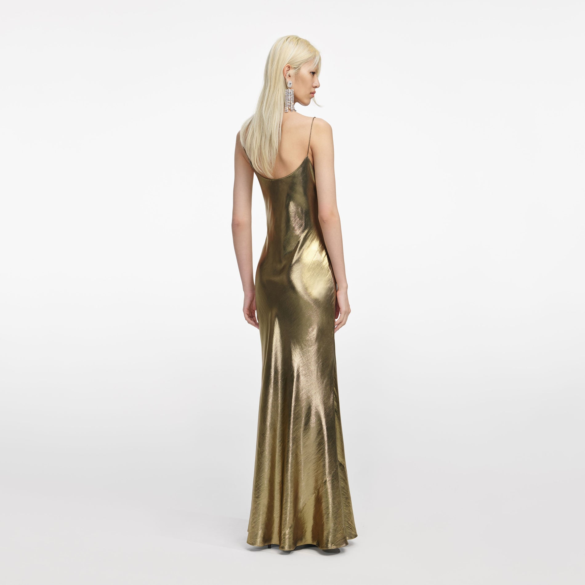 Back view of a woman wearing the Gold Metallic Strappy Maxi Dress