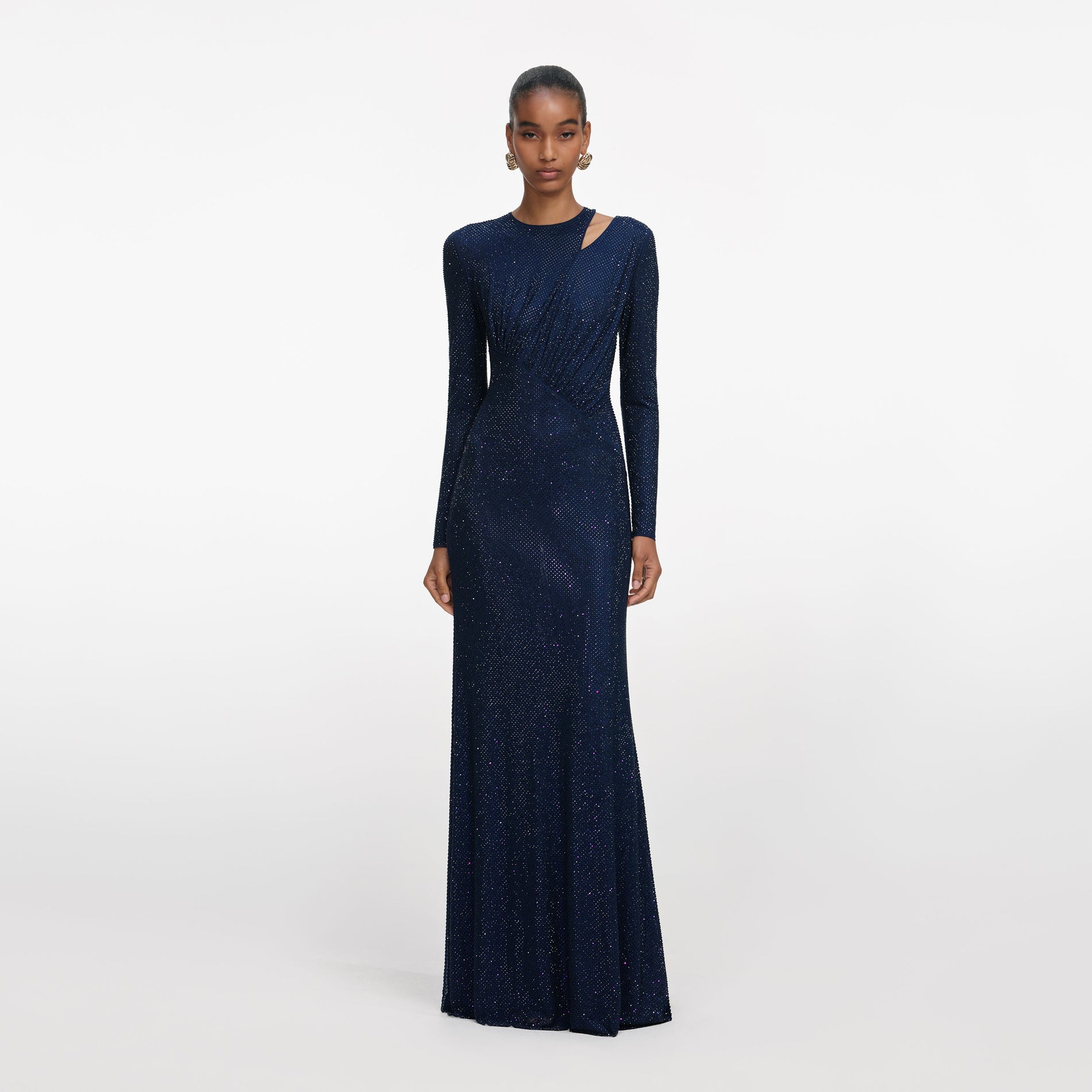 Front view of a woman wearing the Navy Rhinestone Mesh Cut Out Maxi Dress
