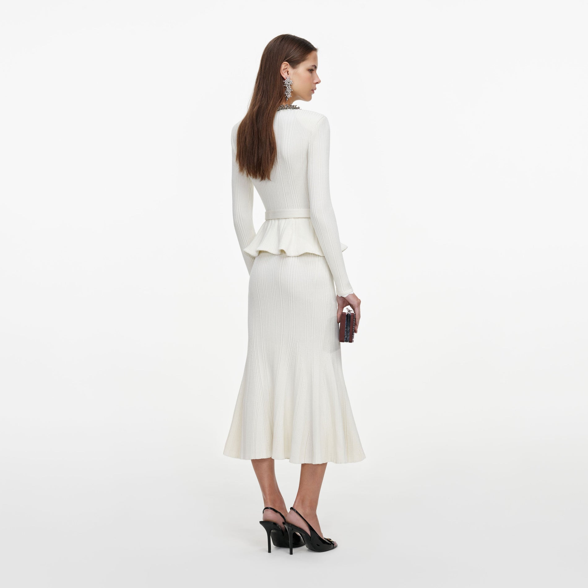Back view of a woman wearing the Cream Lurex Rib Knit Midi Dress