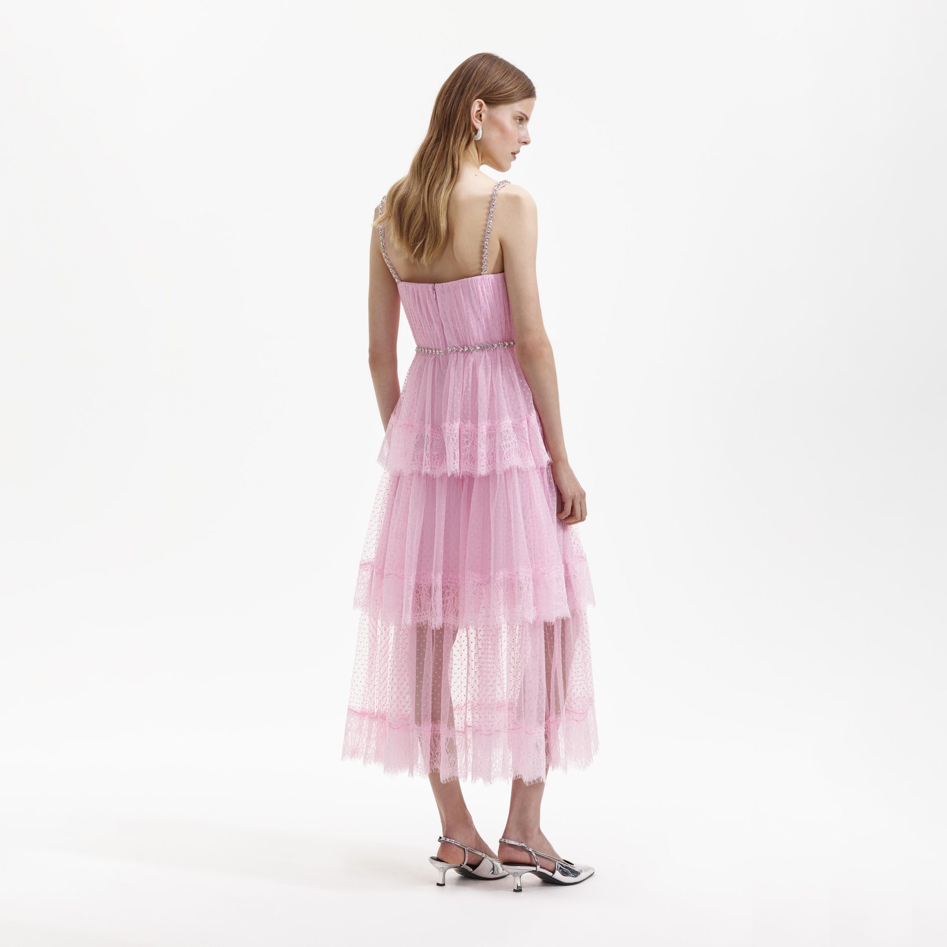 Back view of a woman wearing the Pink Dot Mesh Tier Midi Dress