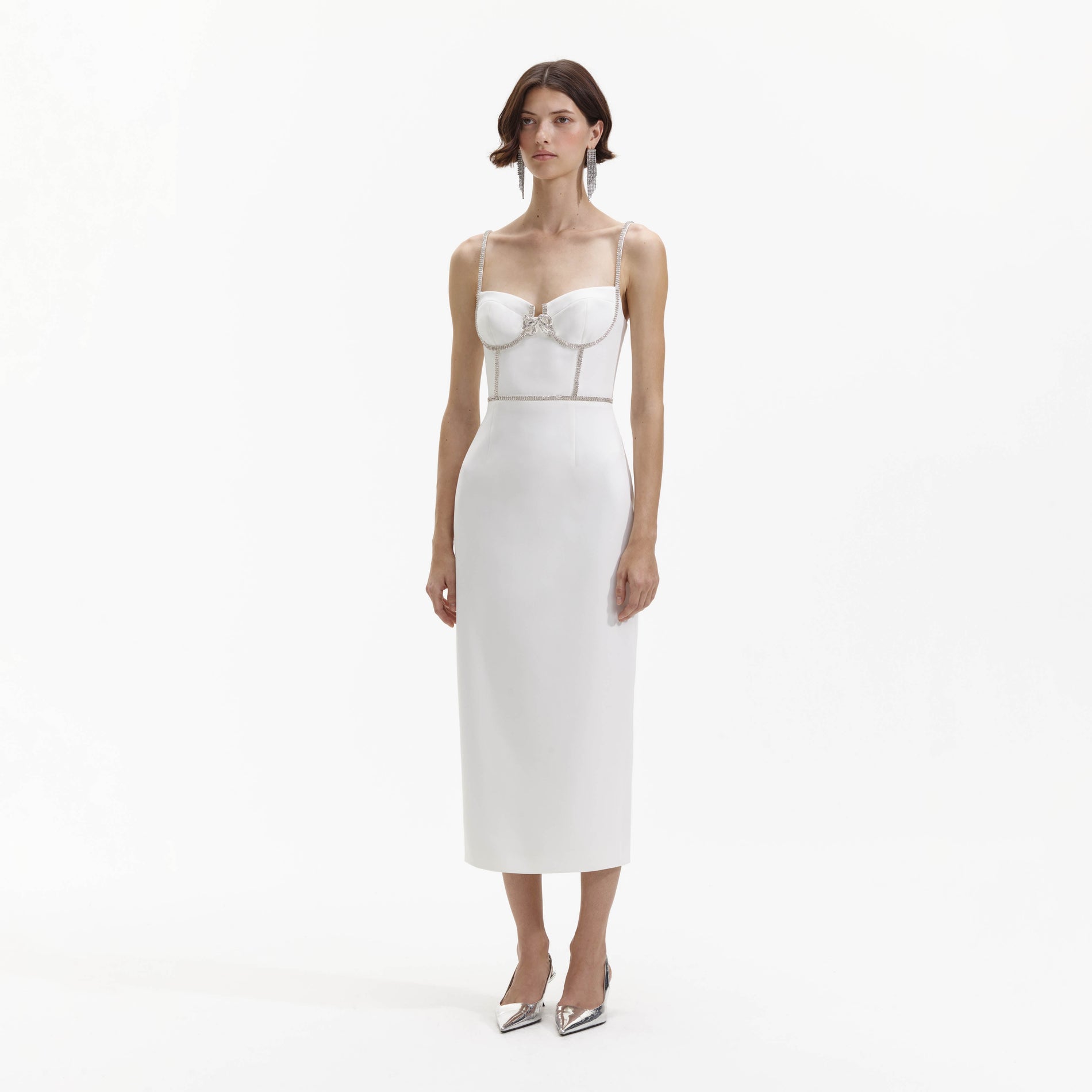 Side view of a woman wearing the White Bonded Crepe Midi Dress