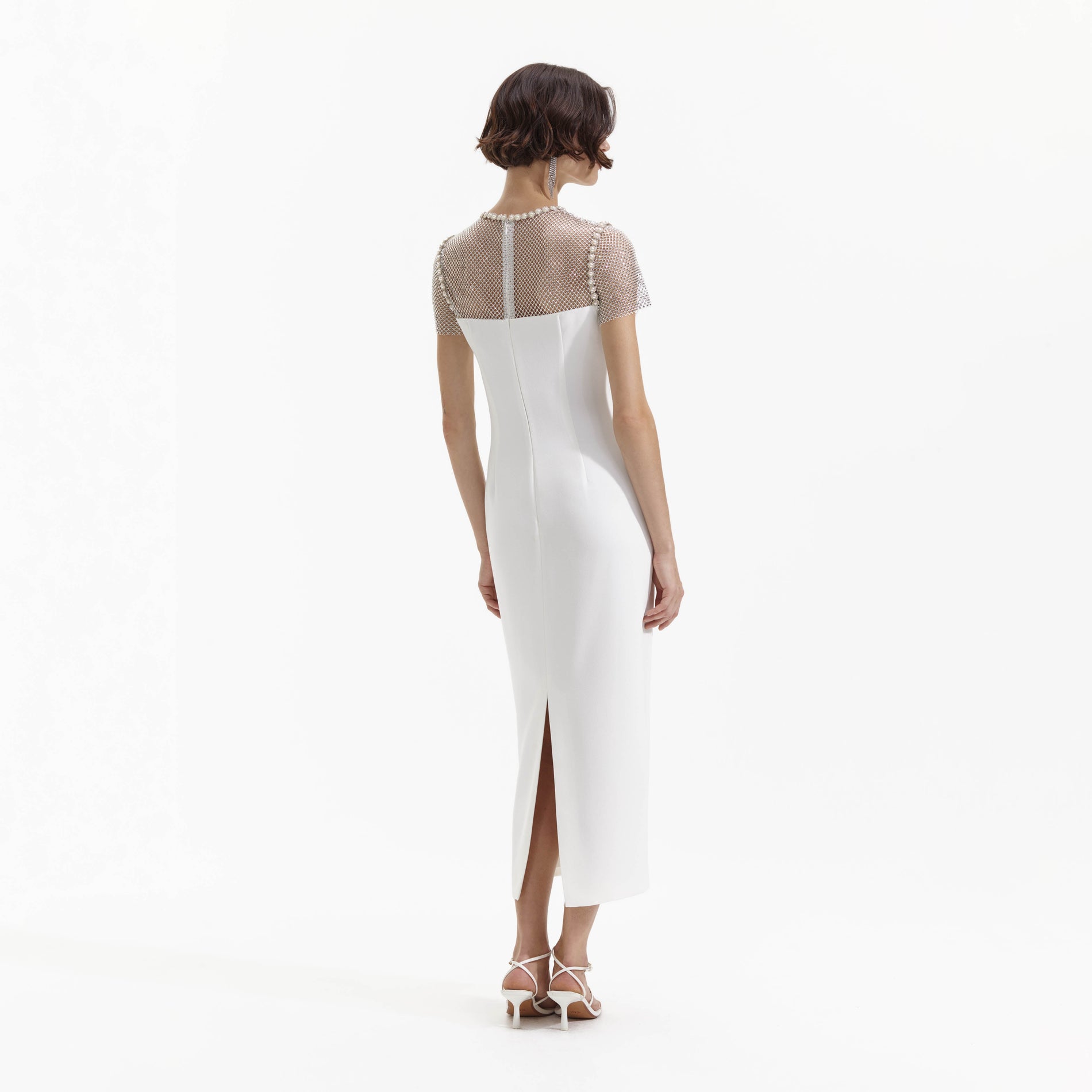 Back view of a woman wearing the White Diamante Crepe Midi Dress