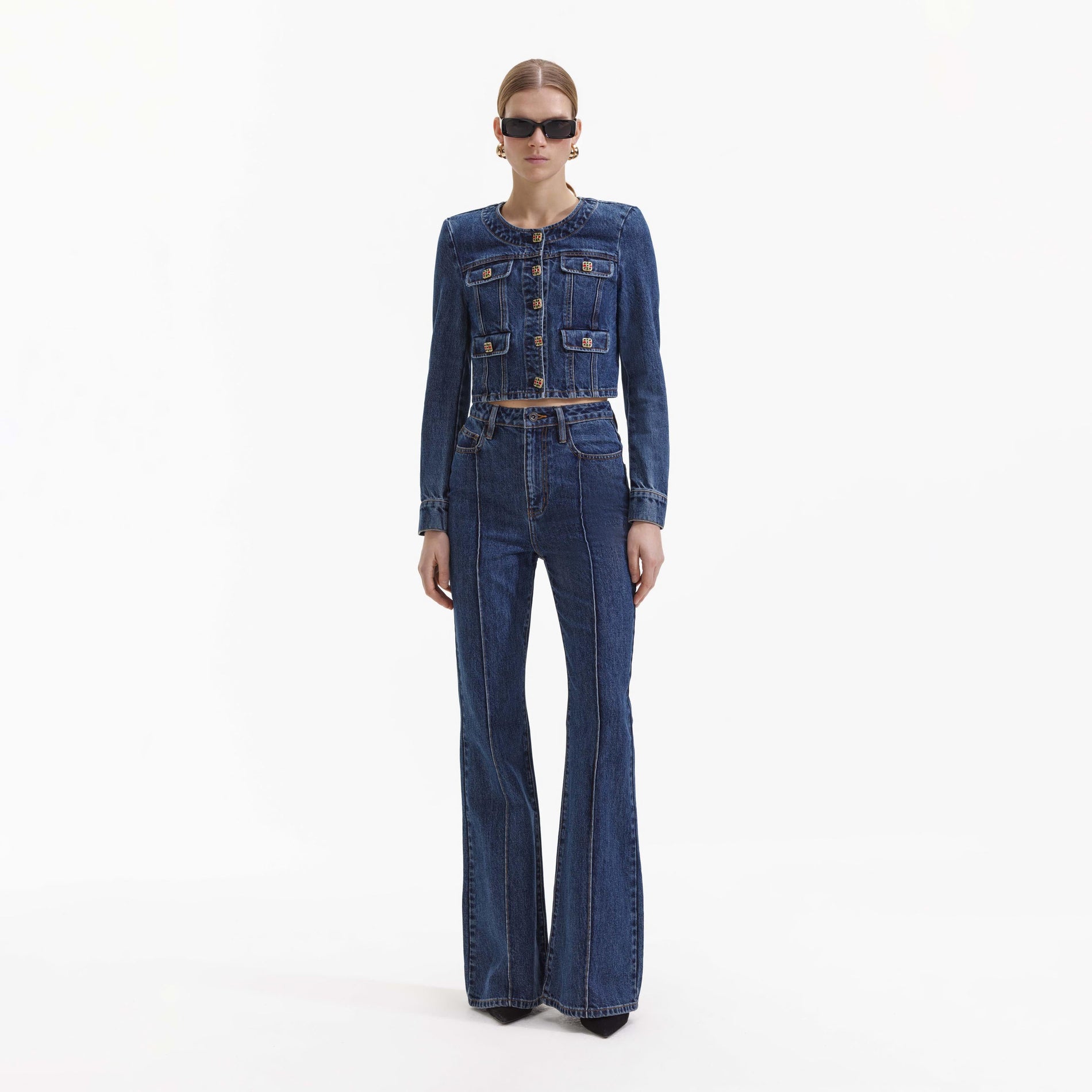 Front view of a woman wearing the Buttoned Denim Jacket