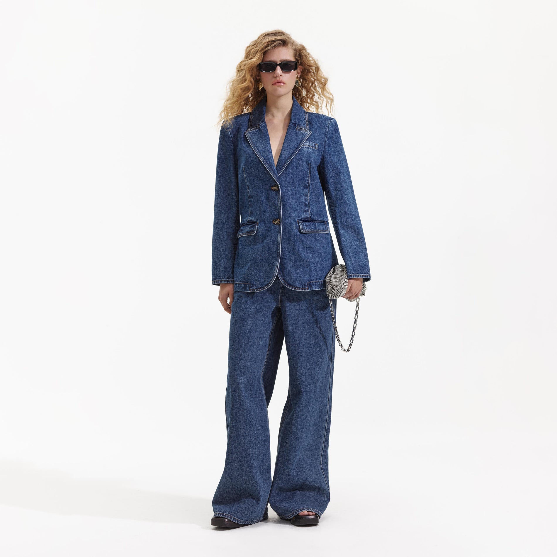 Front view of a woman wearing the Oversized Denim Blazer