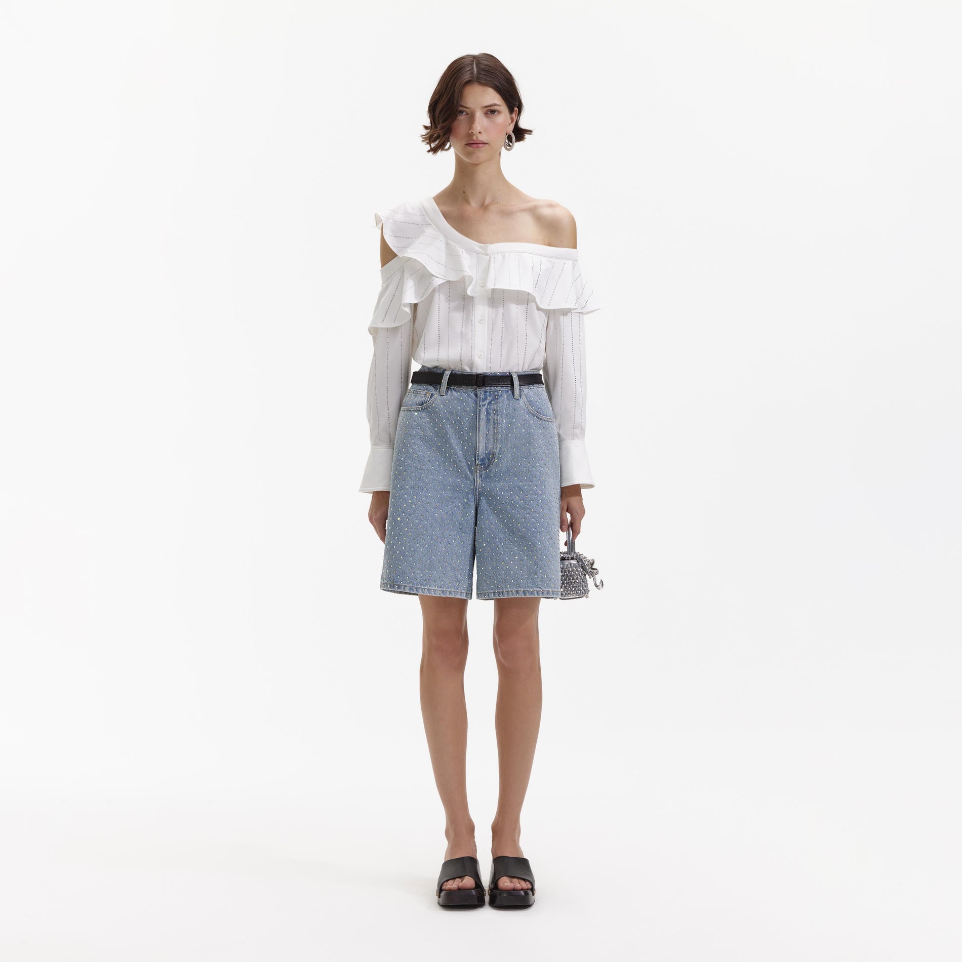 A Woman wearing the Rhinestone Denim Shorts