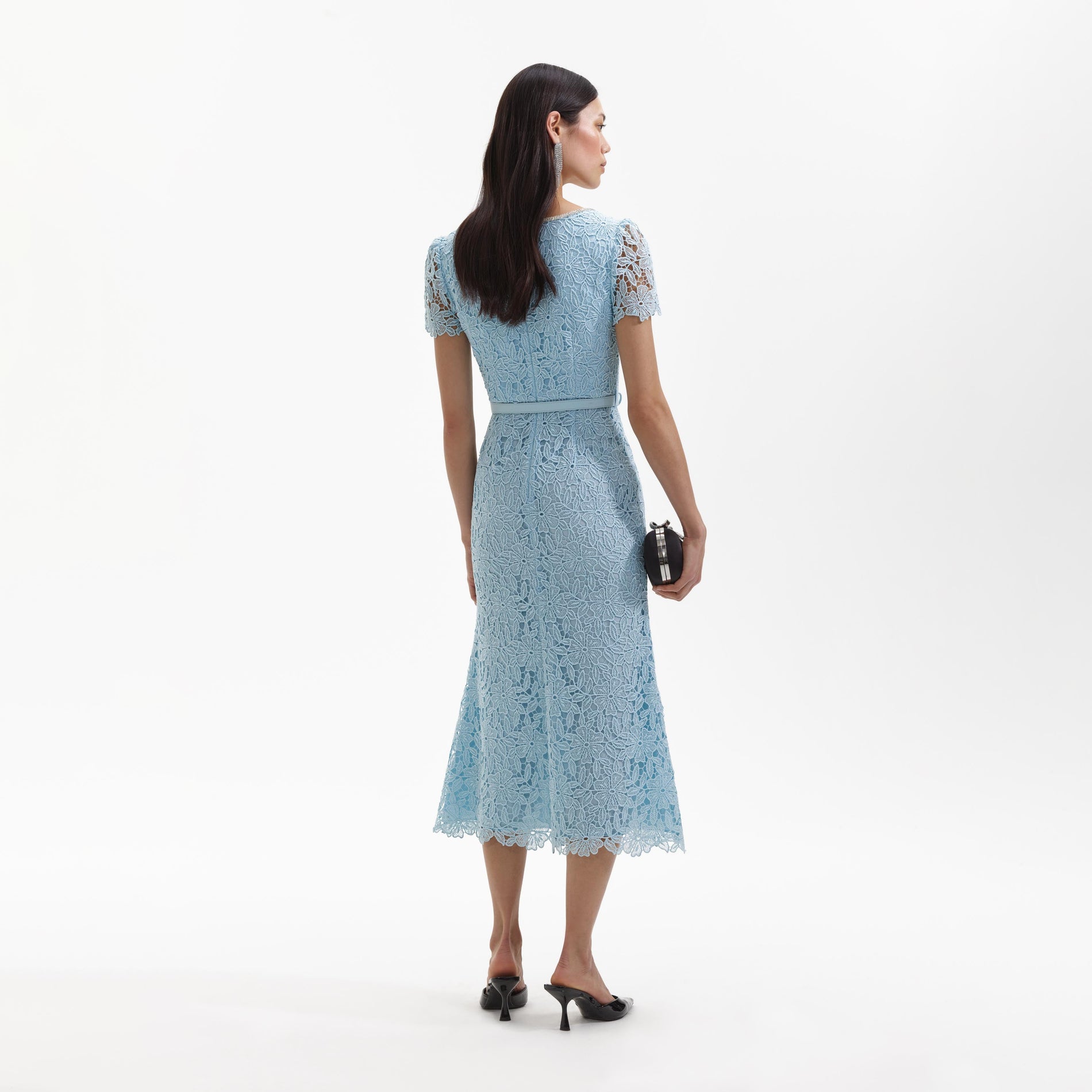 Back view of a woman wearing the Blue Lace Diamante Midi Dress