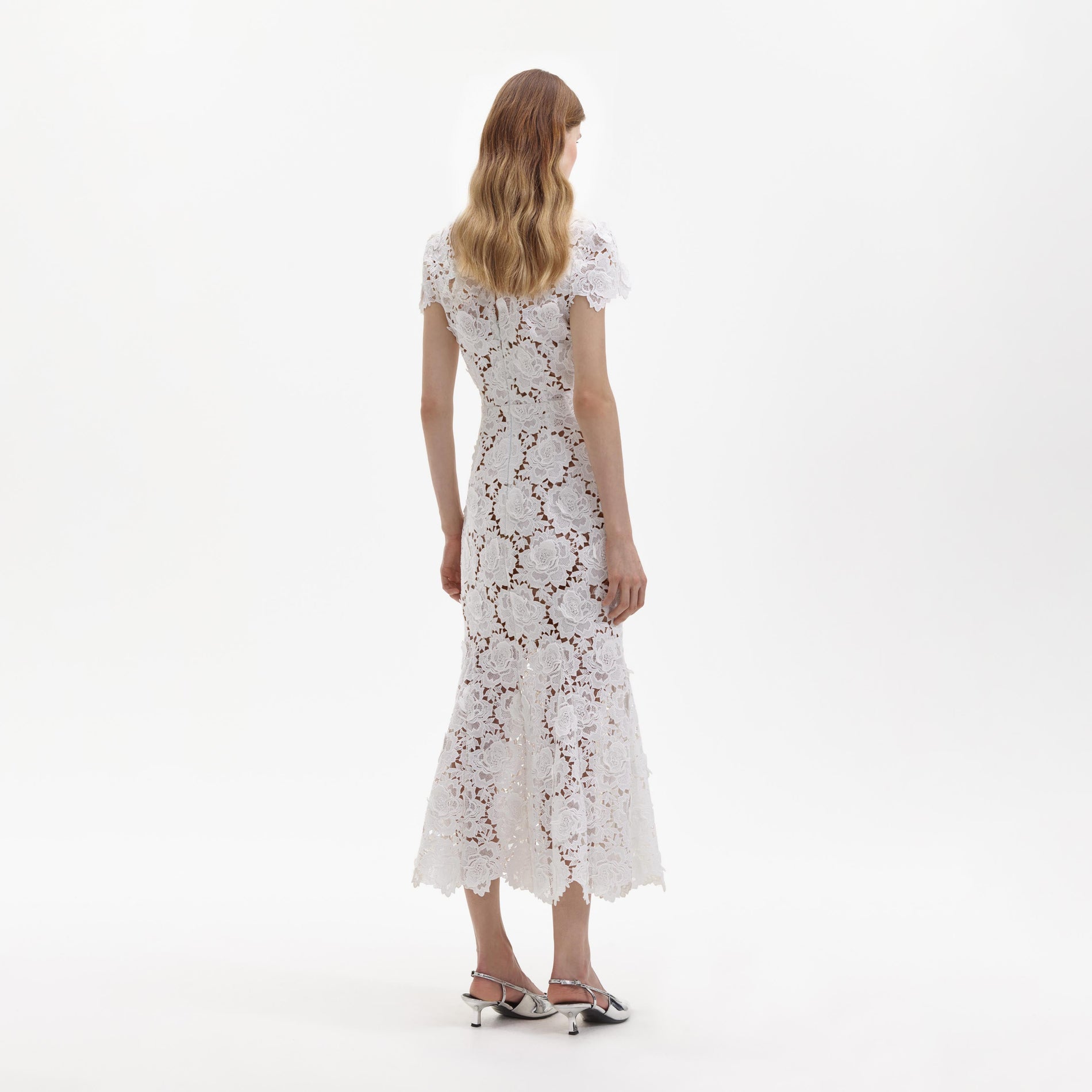 Back view of a woman wearing the White Flower Lace Midi Dress