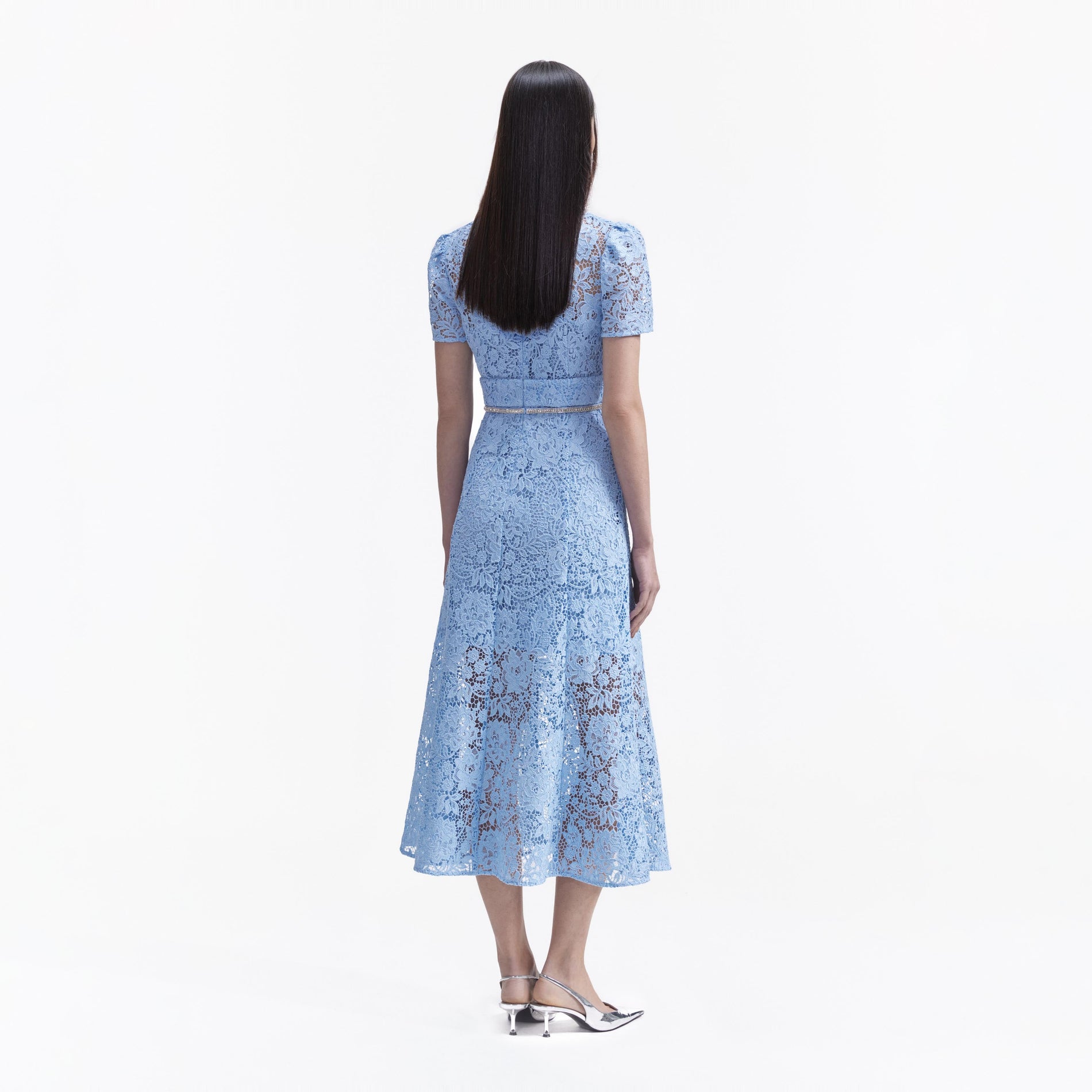 Back view of a woman wearing the Blue Cord Lace Bow Midi Dress