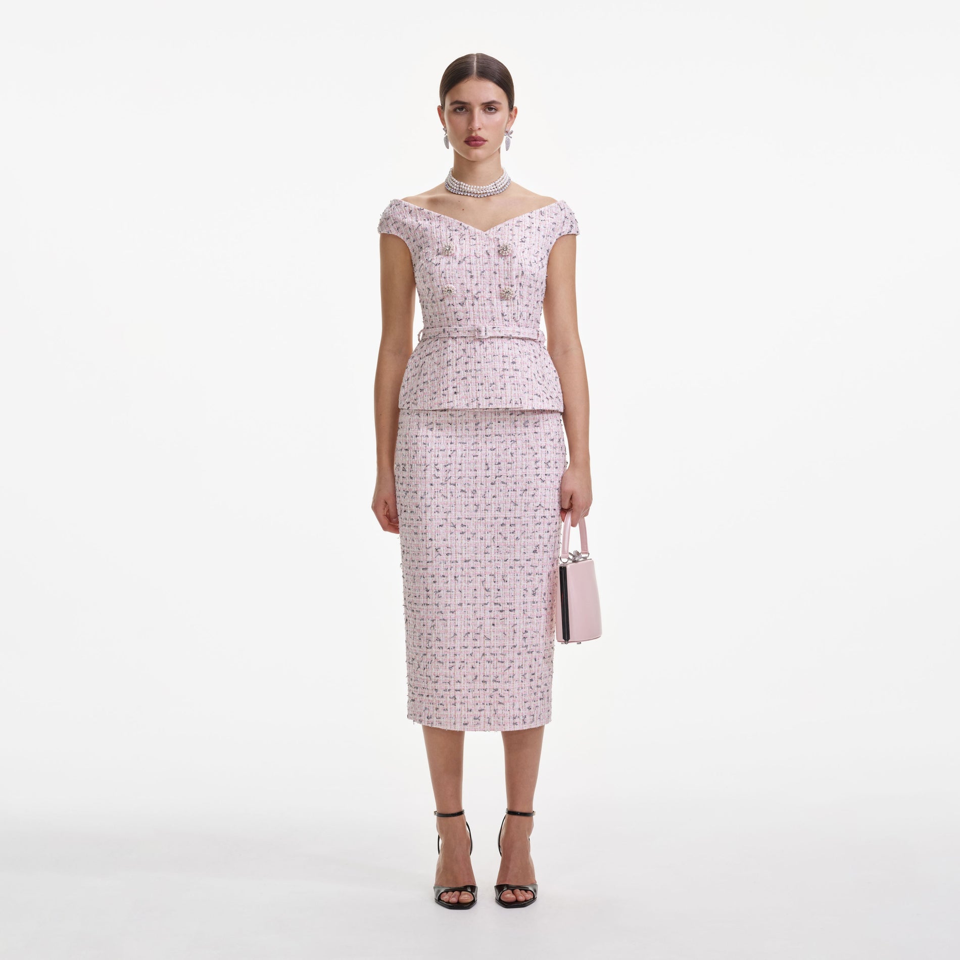 Front view of a woman wearing the Pink Boucle Pearl Midi Dress