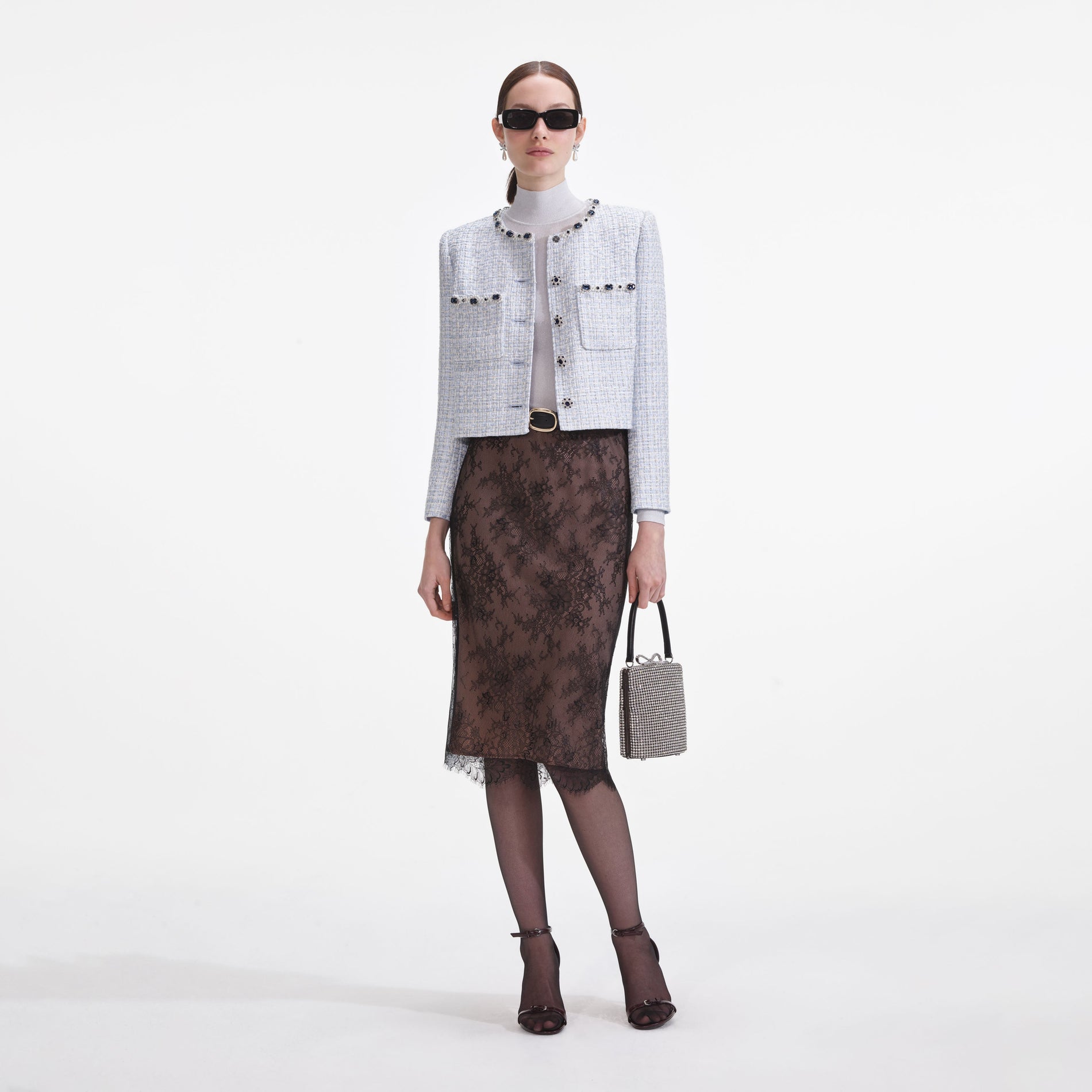 Front view of a woman wearing the Blue Boucle Jacket