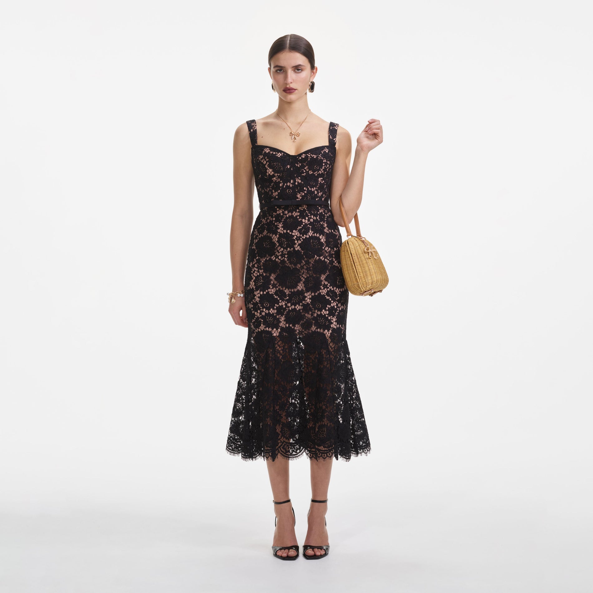 Front view of a woman wearing the Black Fine Lace Midi Dress