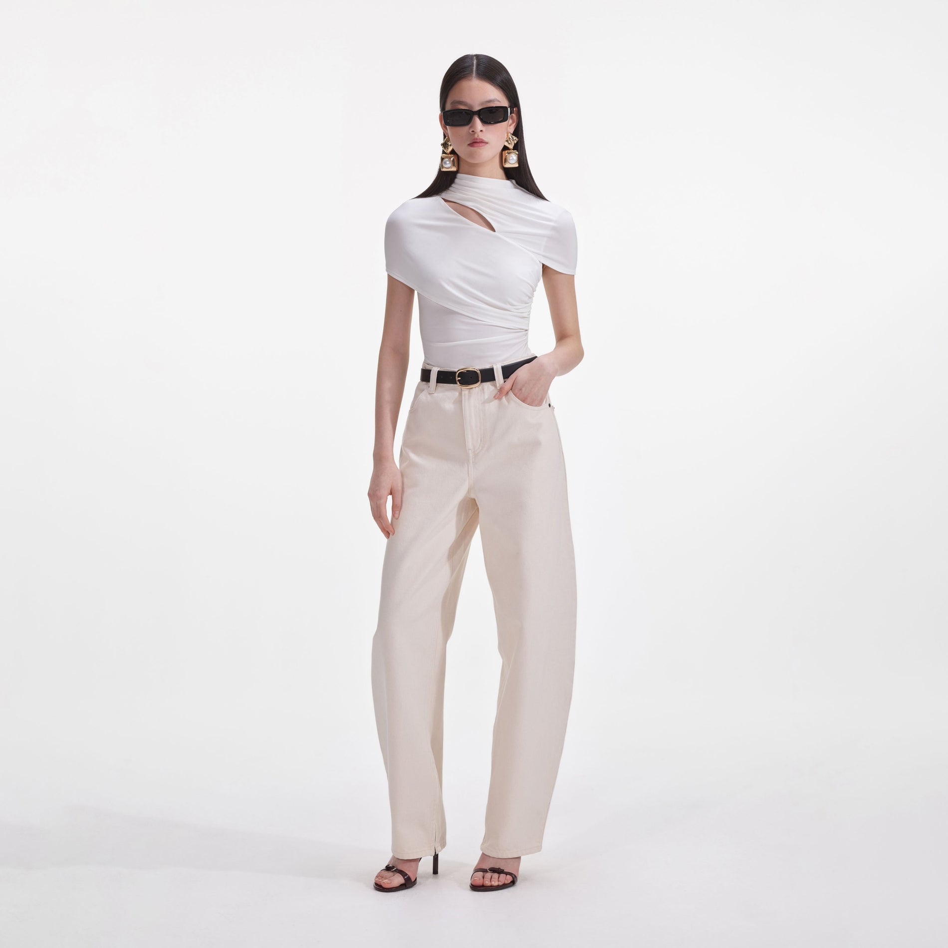 Side view of a woman wearing the Cream Jersey Gathered Top