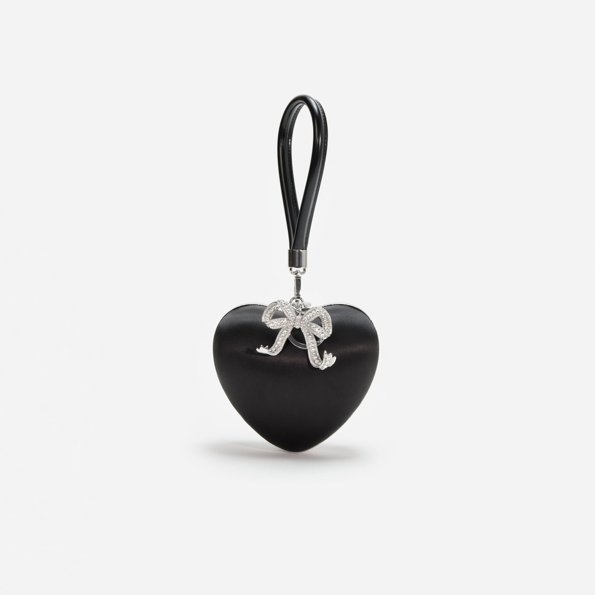 A photo of the Black Satin Top Handle Heart Clutch