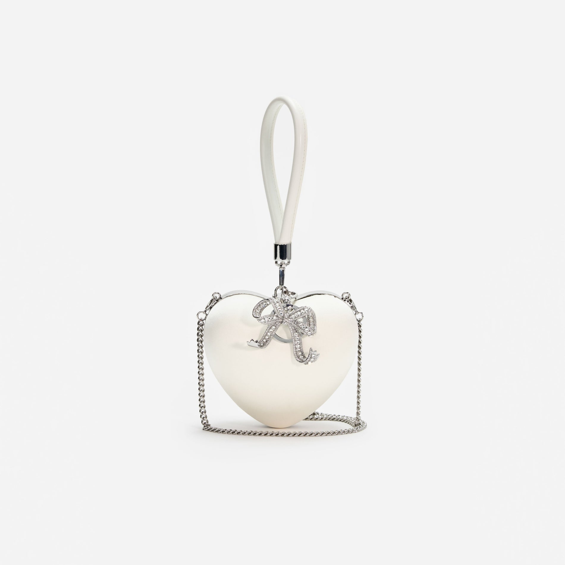 A photo of the Cream Satin Top Handle Heart Clutch