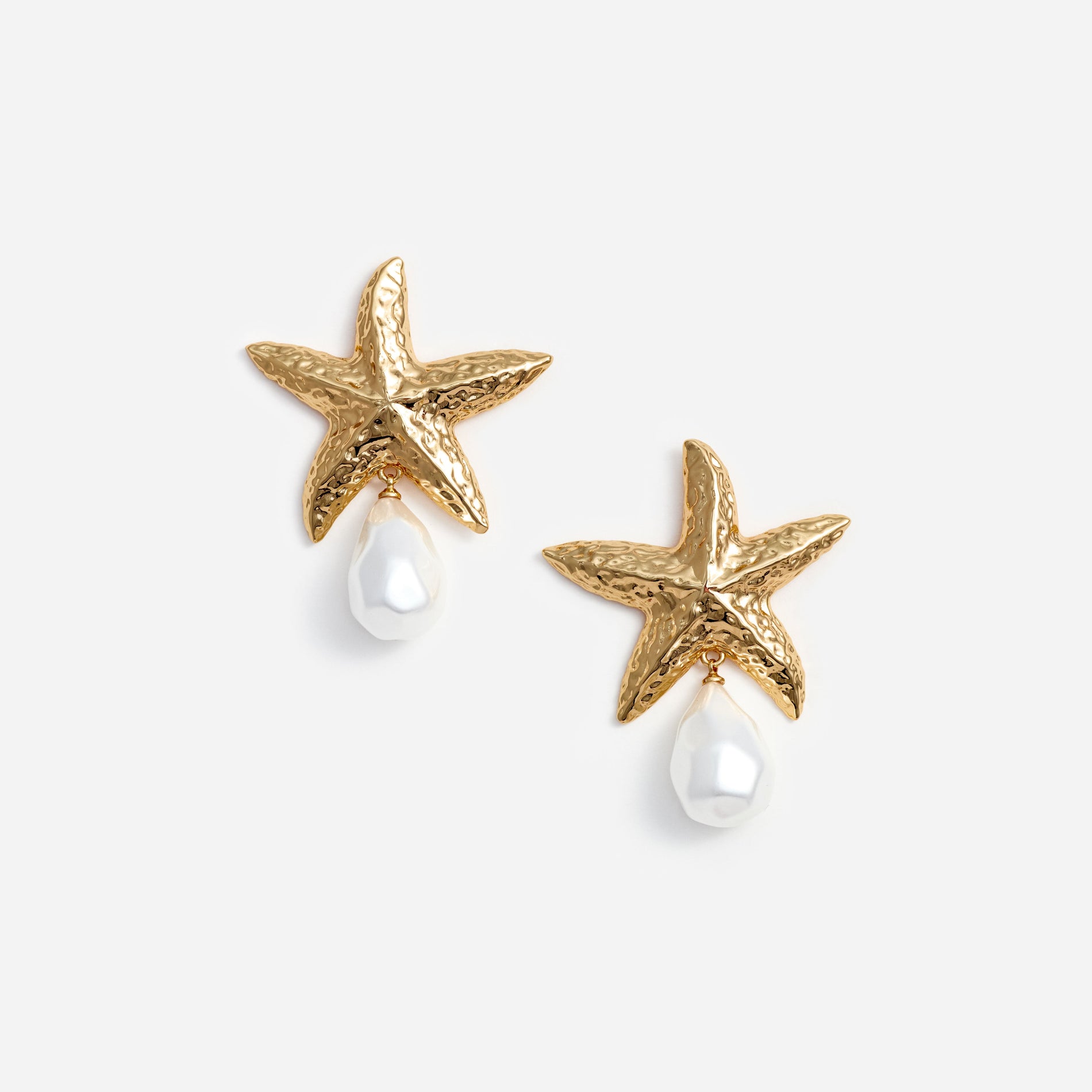 A photo of the Mottled Gold Sea Star Pearl Earrings