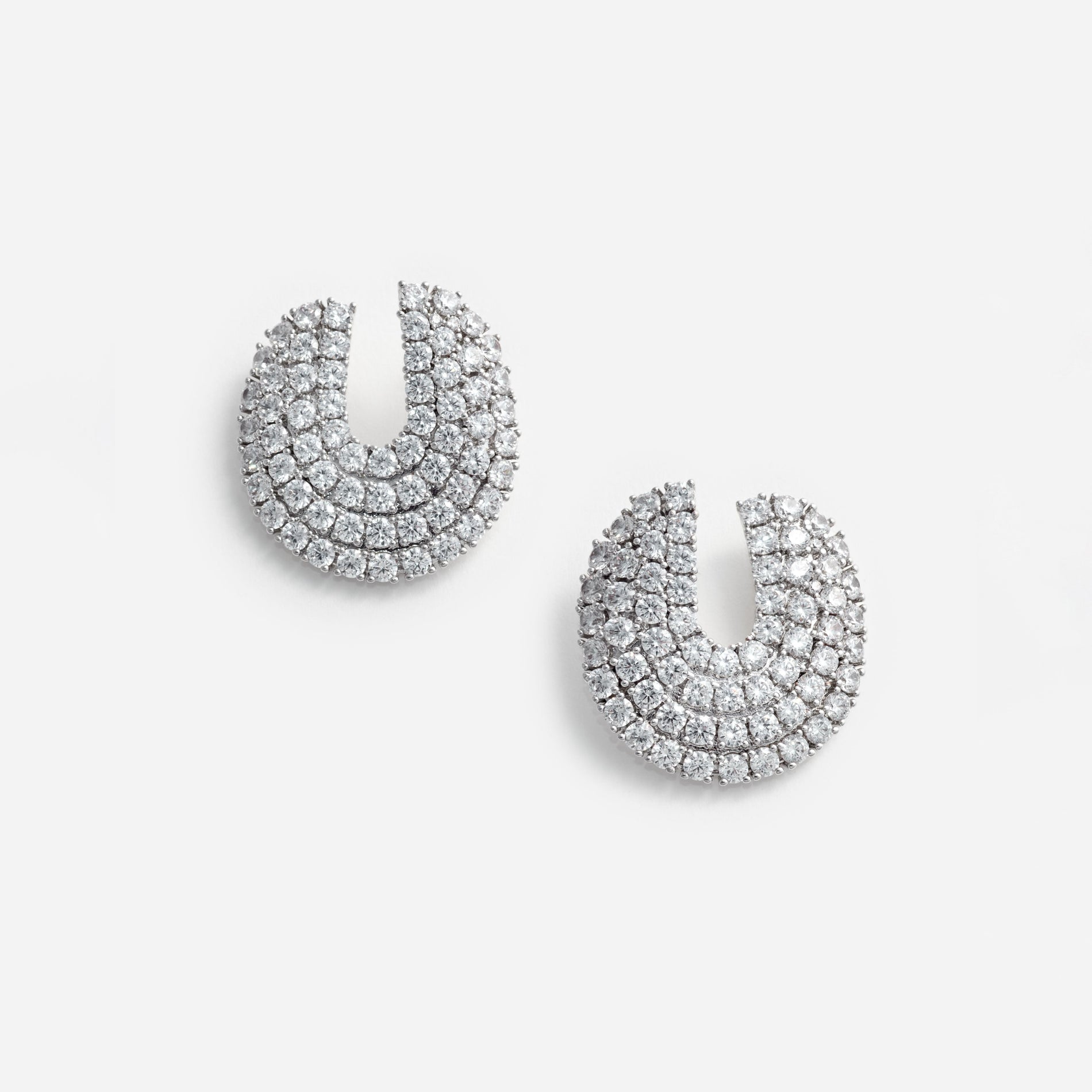 A photo of the Crystal Curved Earrings