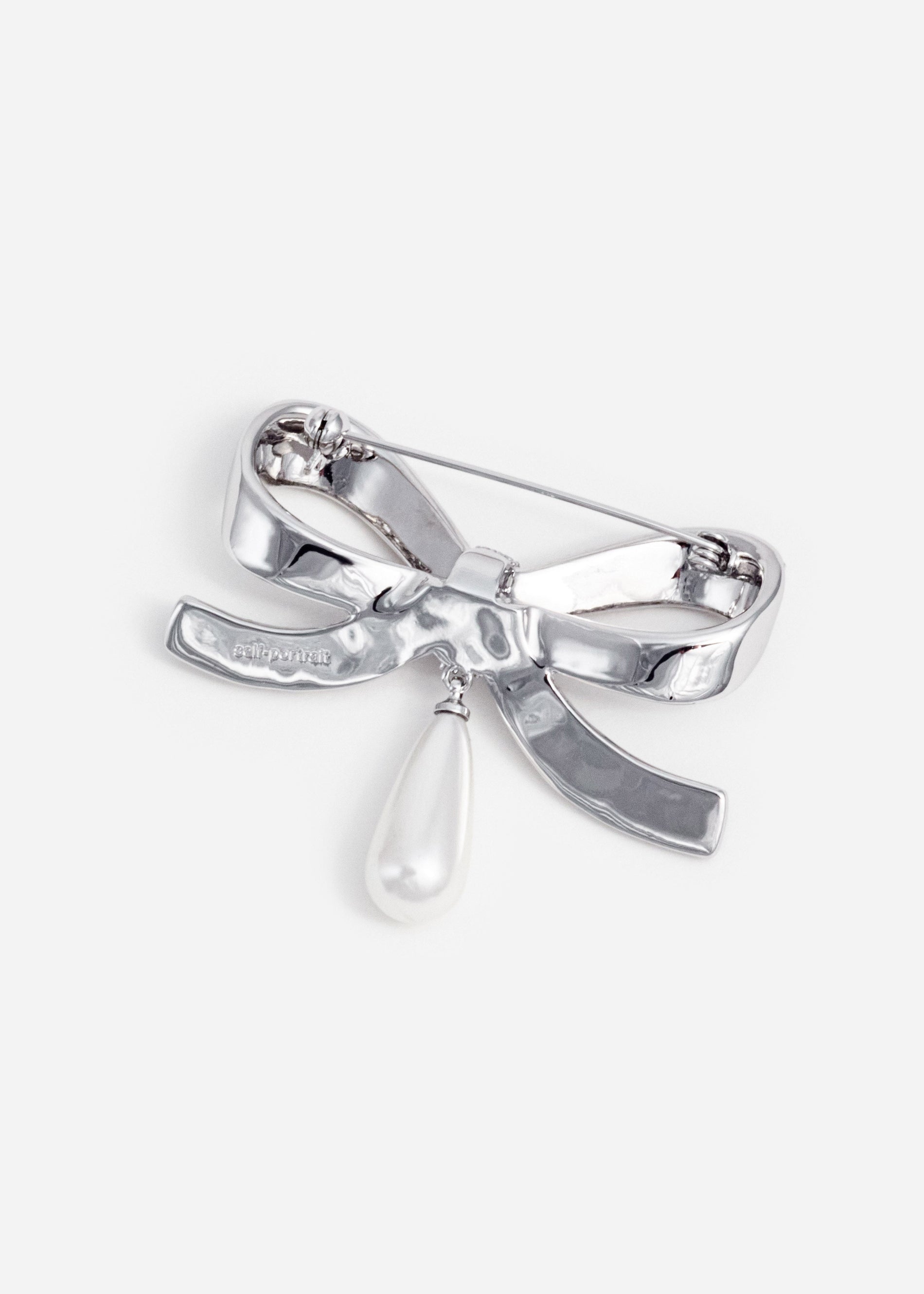 A photo of the Crystal Bow Pearl Droplet Brooch