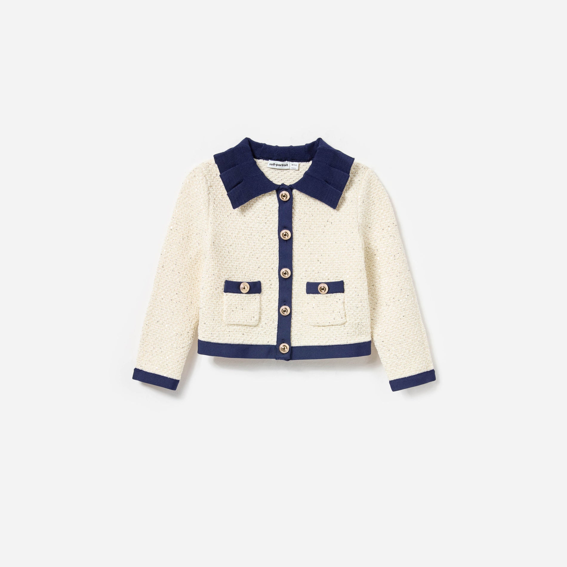 Front view of a woman wearing the Cream Sequin Knit Cardigan