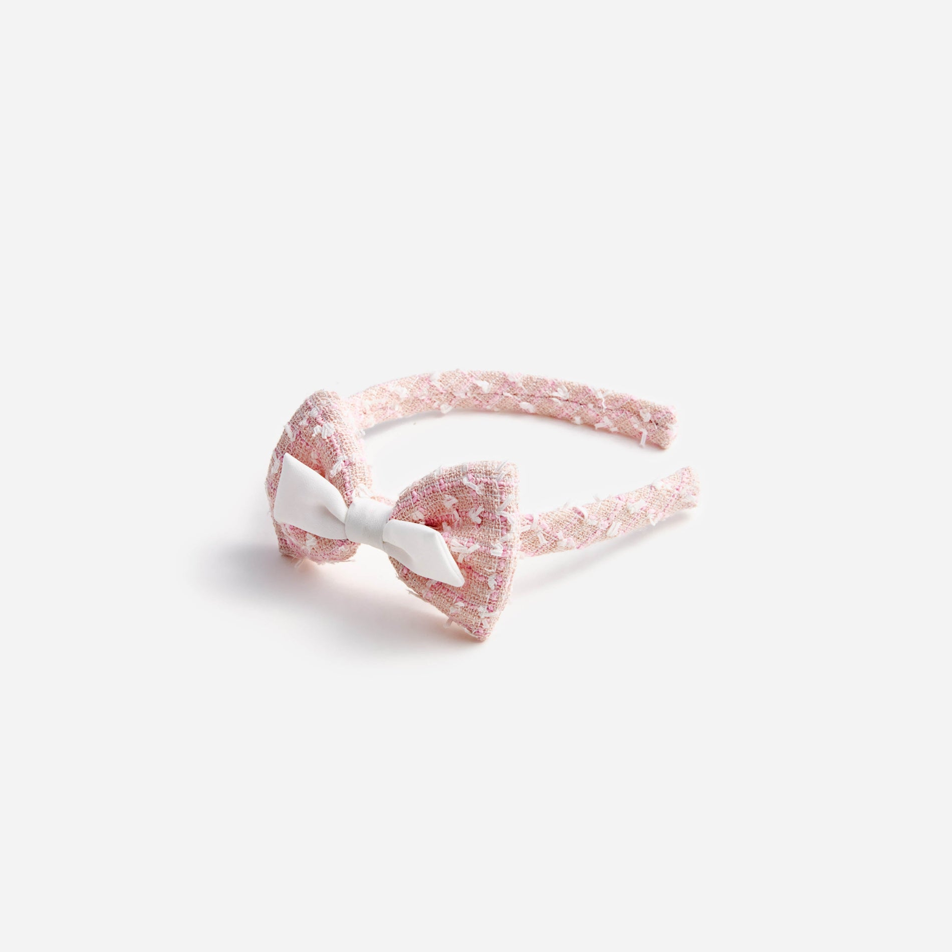 A photo of the Pink Boucle Bow Headband
