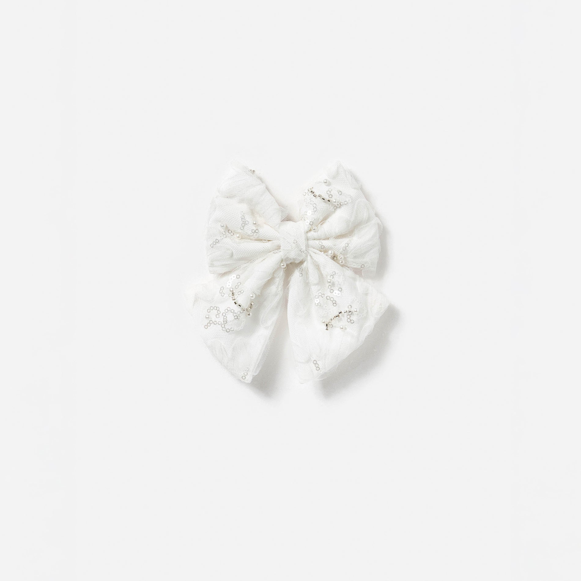 A photo of the Cream Tulle Hair Bow