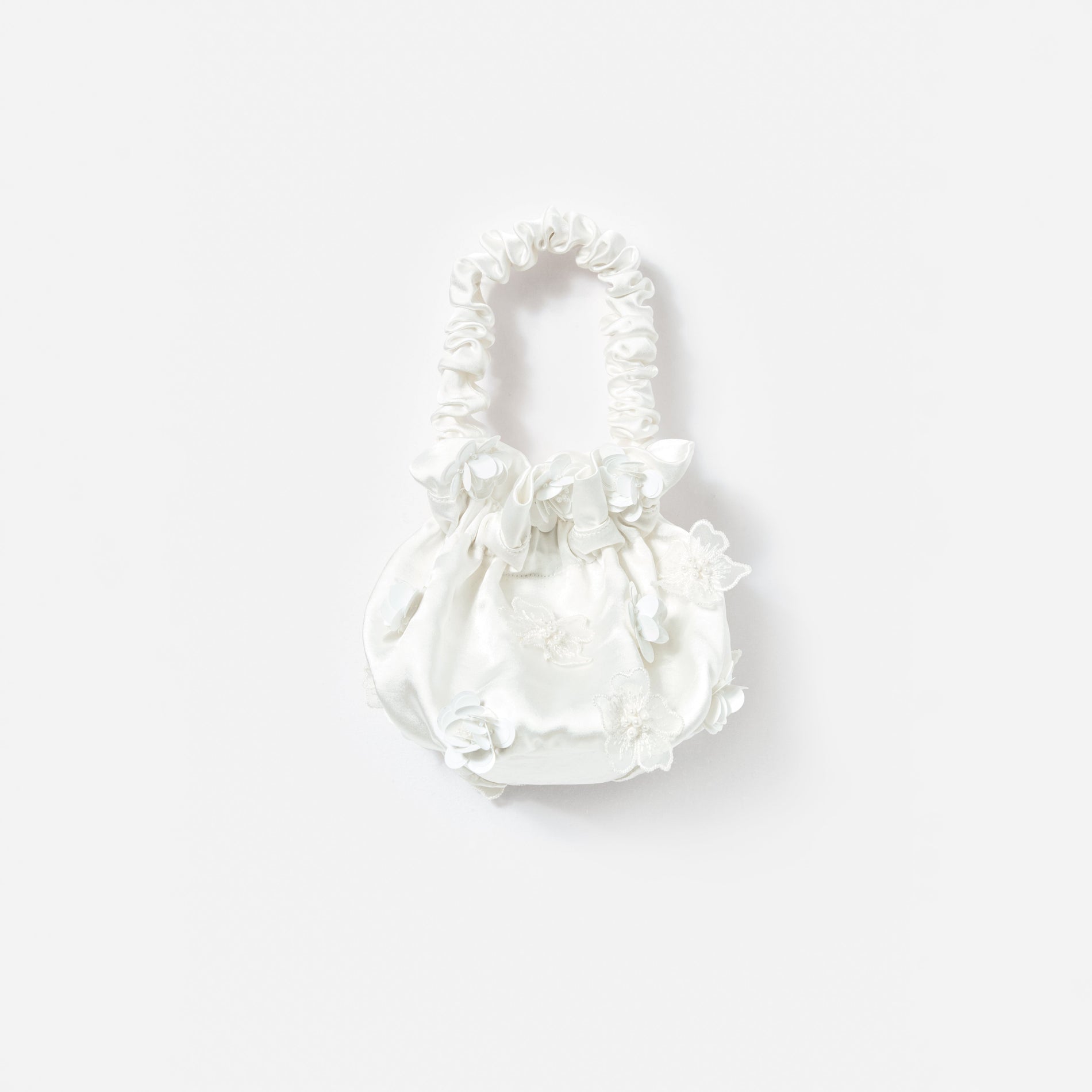 A photo of the Cream Satin Flower Bag