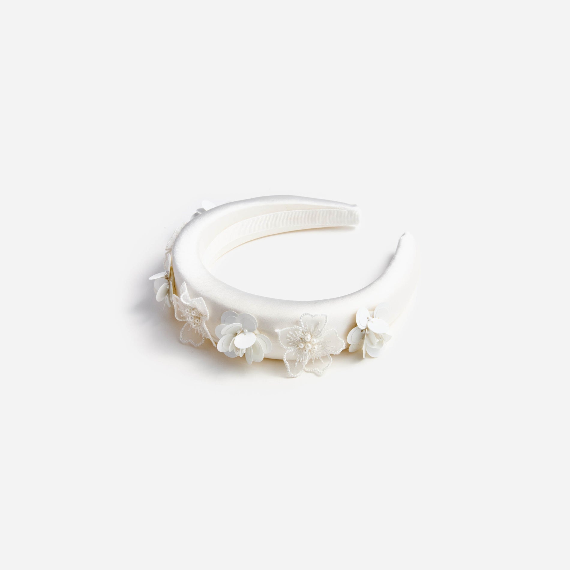 A photo of the Cream Satin Flower Headband