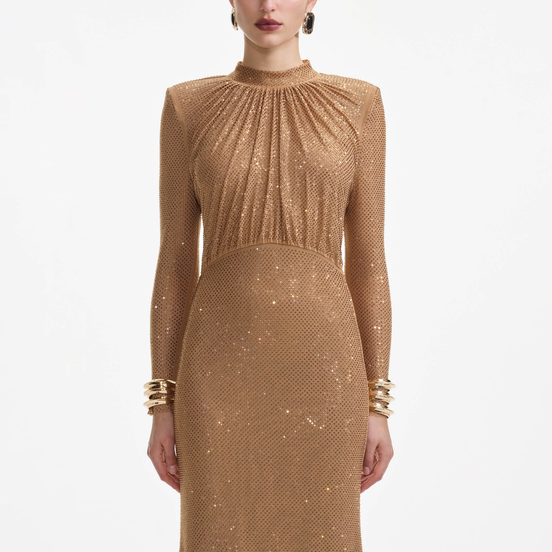 A close up of a woman wearing the Brown Rhinestone Gathered Maxi Dress