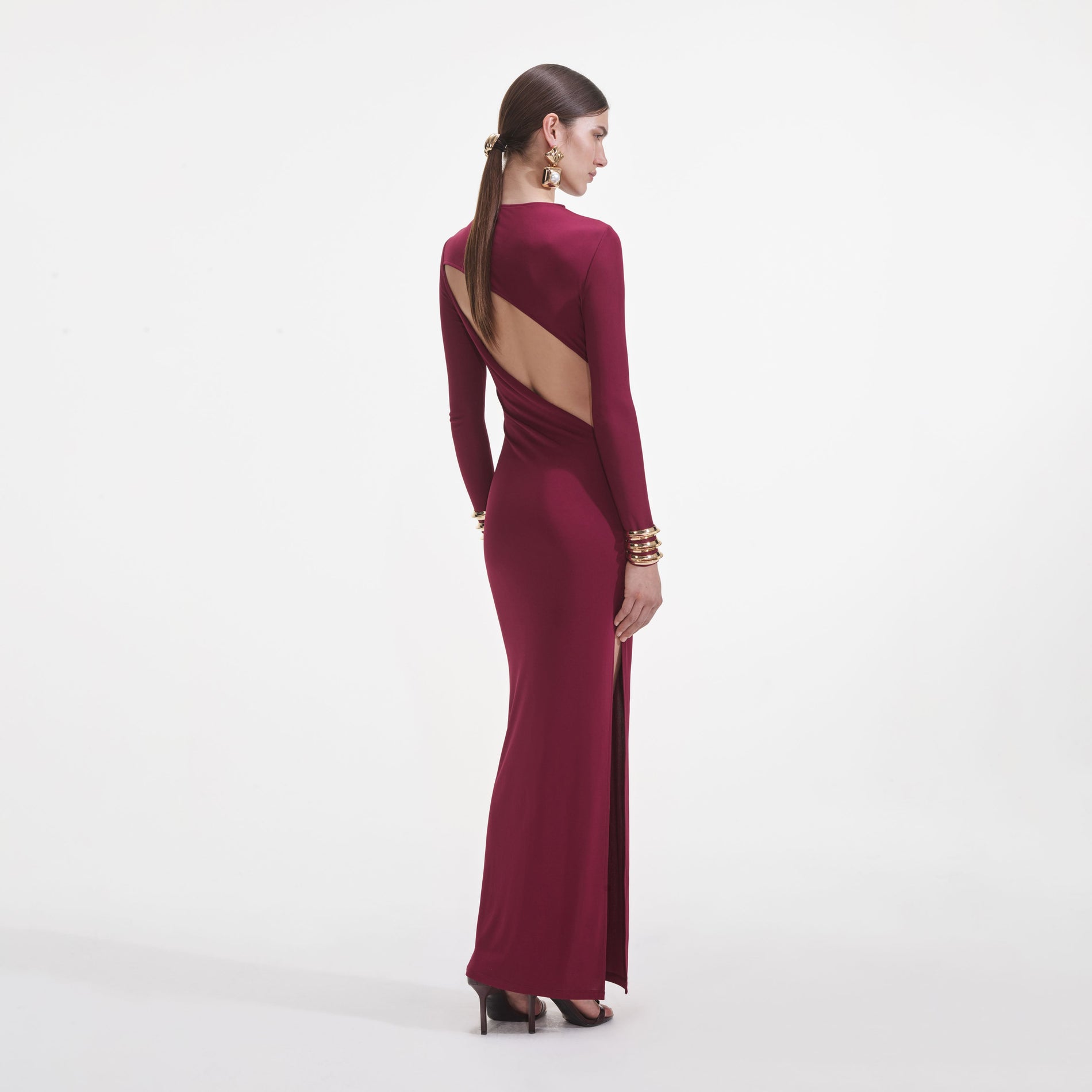 Back view of a woman wearing the Burgundy Jersey Gathered Midi Dress