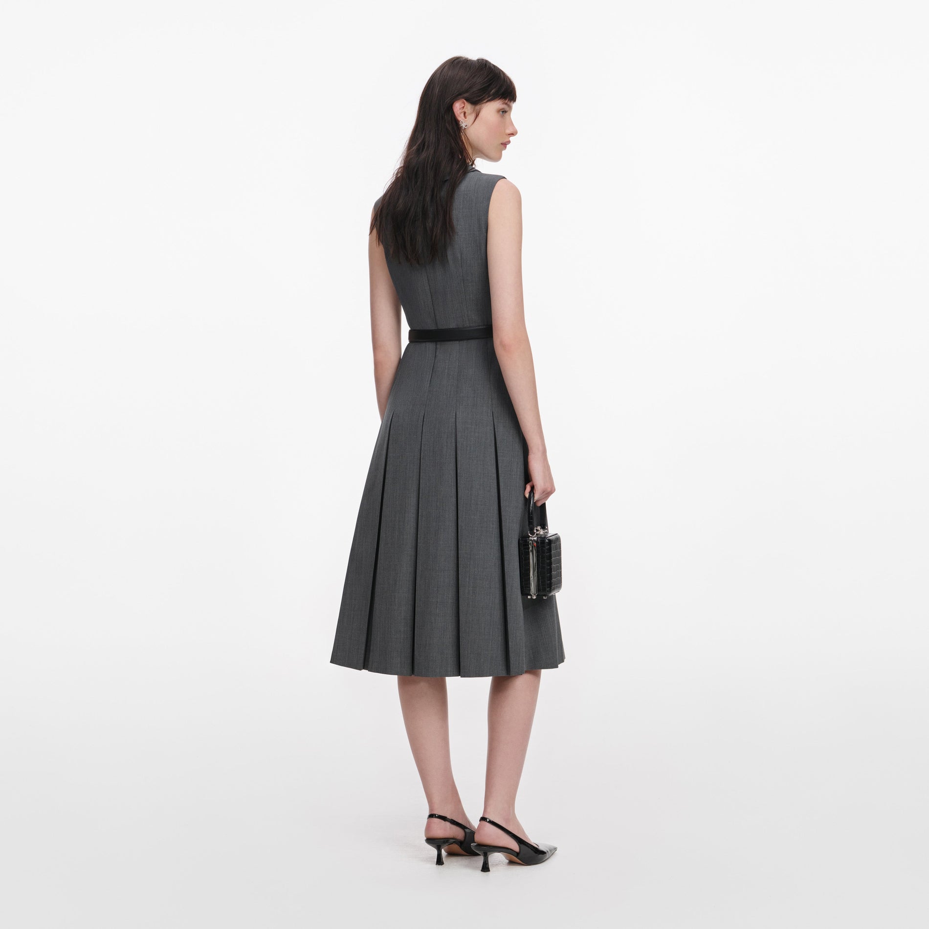 Back view of a woman wearing the Grey Tailored Pleated Midi Dress
